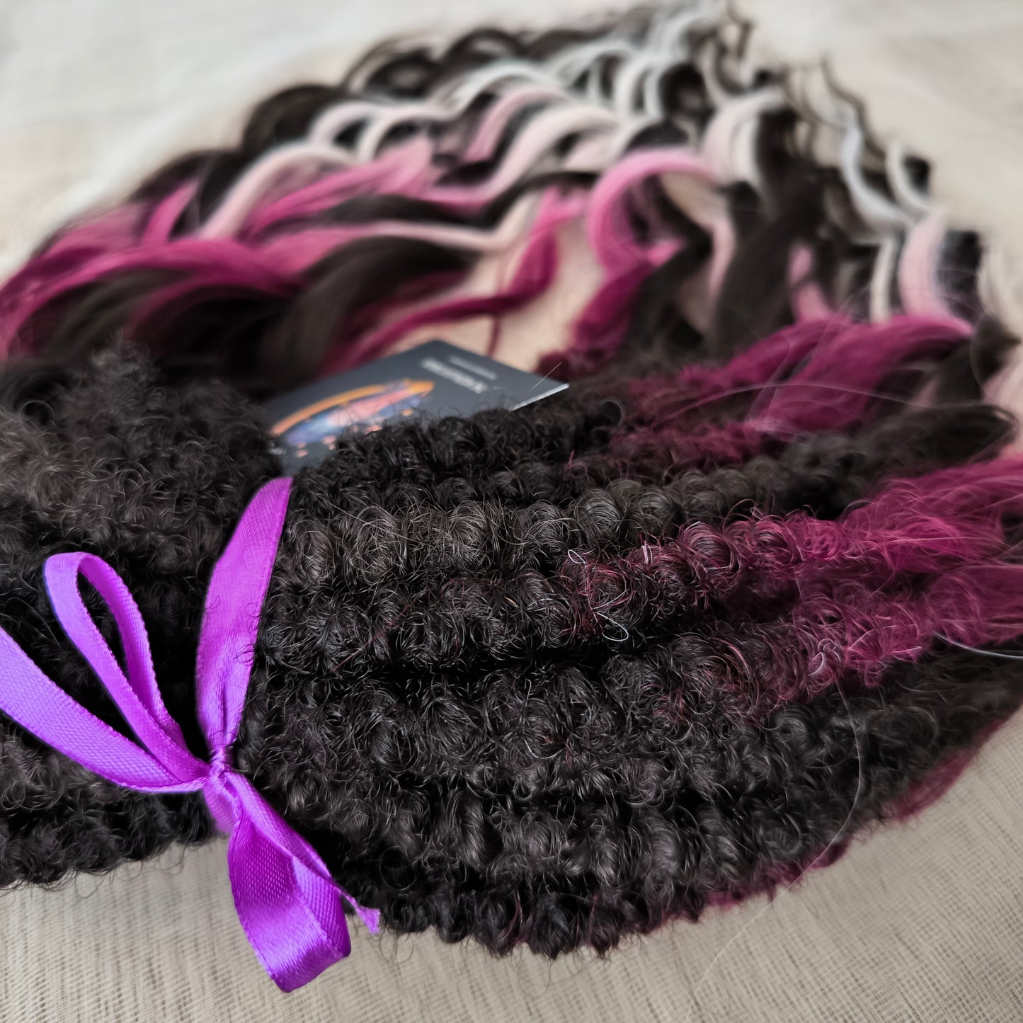 Velvet Twilight - handcrafted set features a rich gradient of deep chocolate brown, dark berry, magenta, and icy platinum - perfect for those who love a dramatic yet elegant look.
Soft, lightweight, and reusable synthetic brushable double ended wavy dreadlocks.