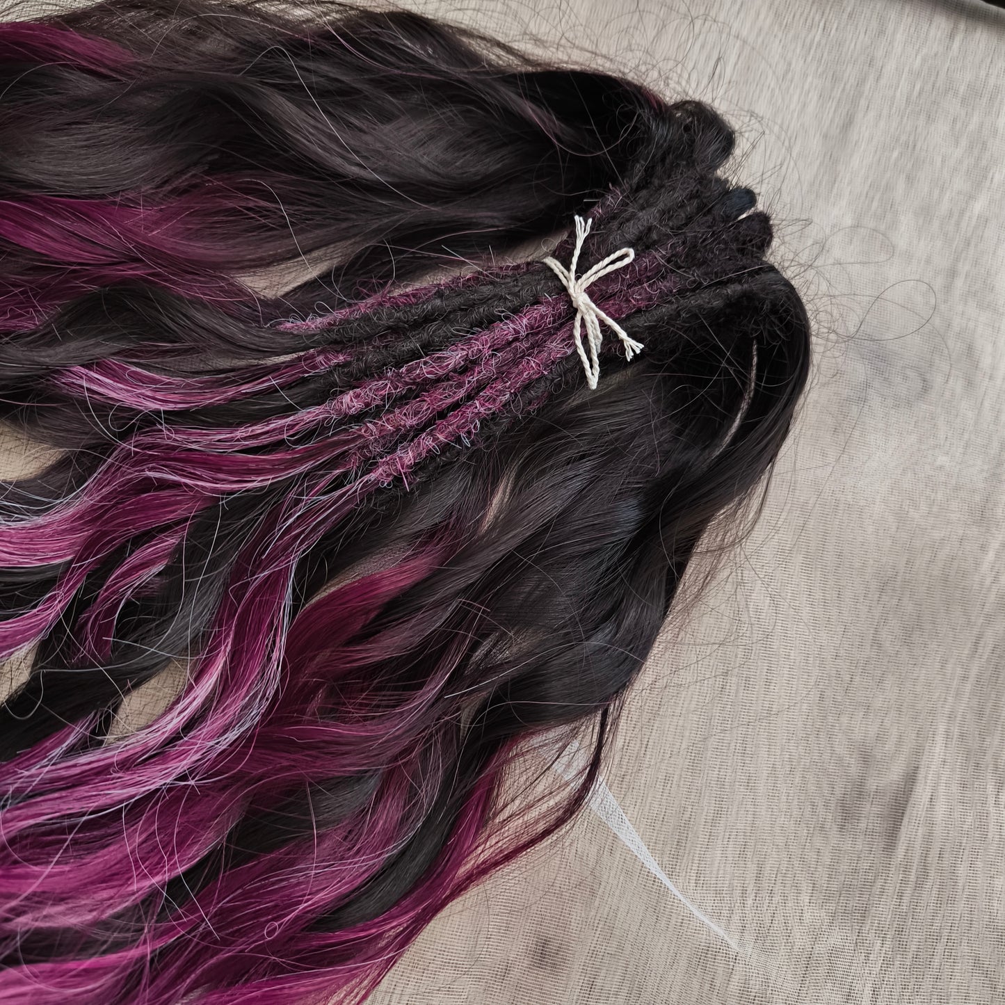 Velvet Twilight - handcrafted set features a rich gradient of deep chocolate brown, dark berry, magenta, and icy platinum - perfect for those who love a dramatic yet elegant look.
Soft, lightweight, and reusable synthetic brushable double ended wavy dreadlocks.