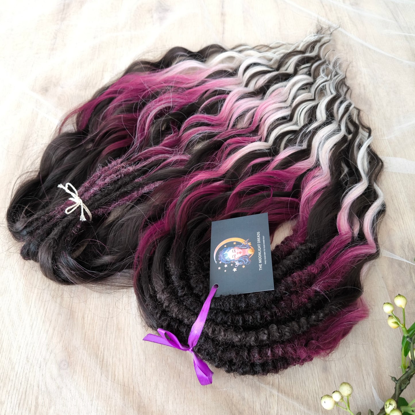 Velvet Twilight - handcrafted set features a rich gradient of deep chocolate brown, dark berry, magenta, and icy platinum - perfect for those who love a dramatic yet elegant look.
Soft, lightweight, and reusable synthetic brushable double ended wavy dreadlocks.