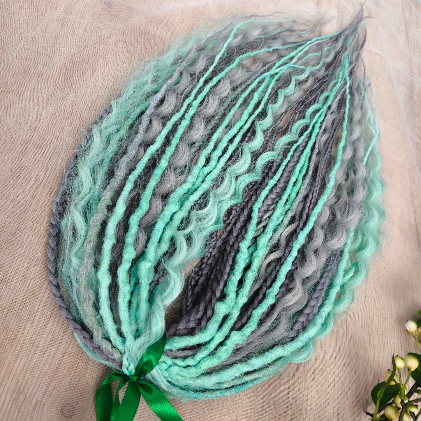 Mix of silver grey and mint green synthetic partial set of 34 double ended dreads, braids, dreaded curls.