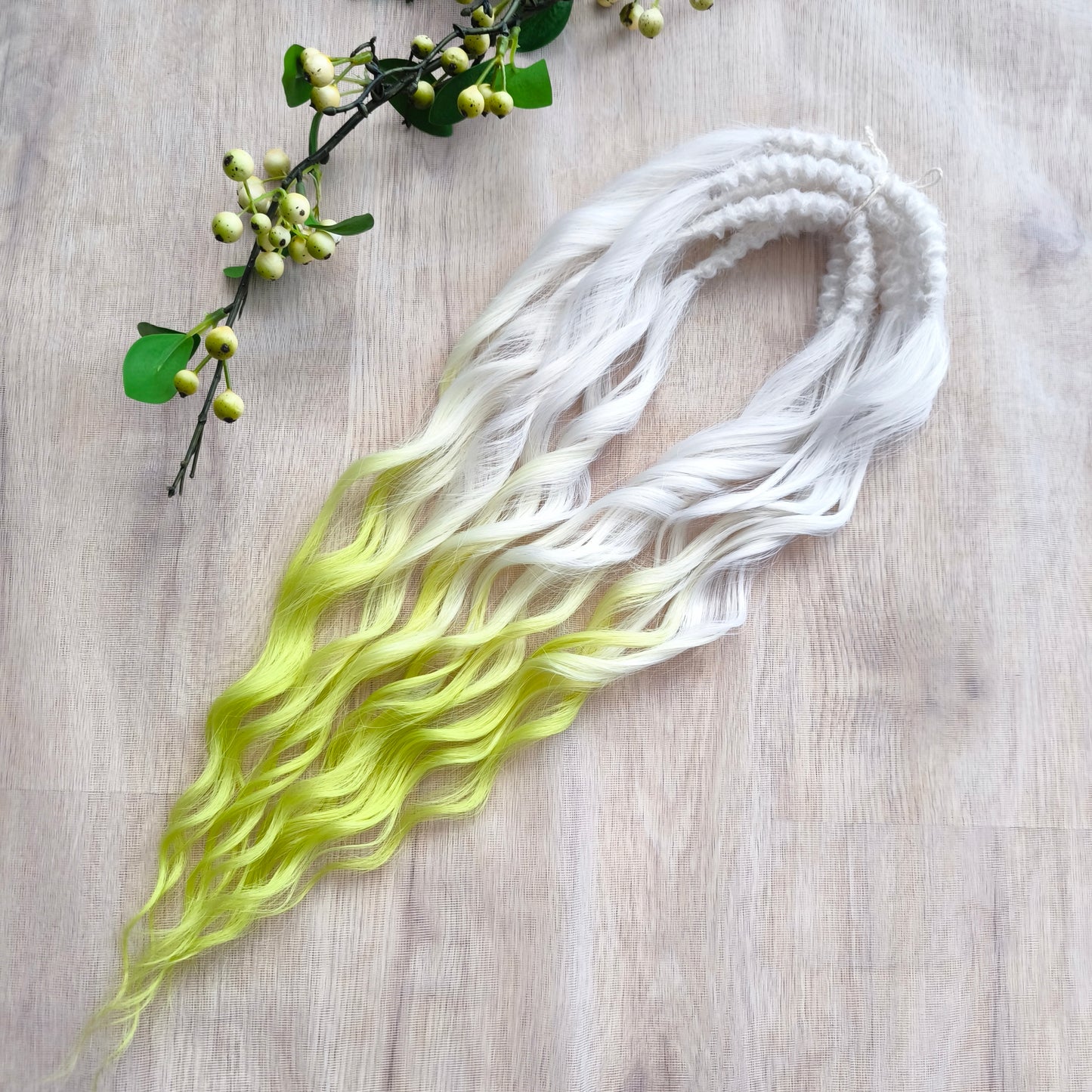 Lemon Frost - radiant ombré starts with an icy white base, melts into soft pastel lemon, and flows into a bold neon yellow-green at the tips. Soft, lightweight, and reusable synthetic brushable double ended wavy dreadlocks (regular dreaded, braided middle, or push-up).