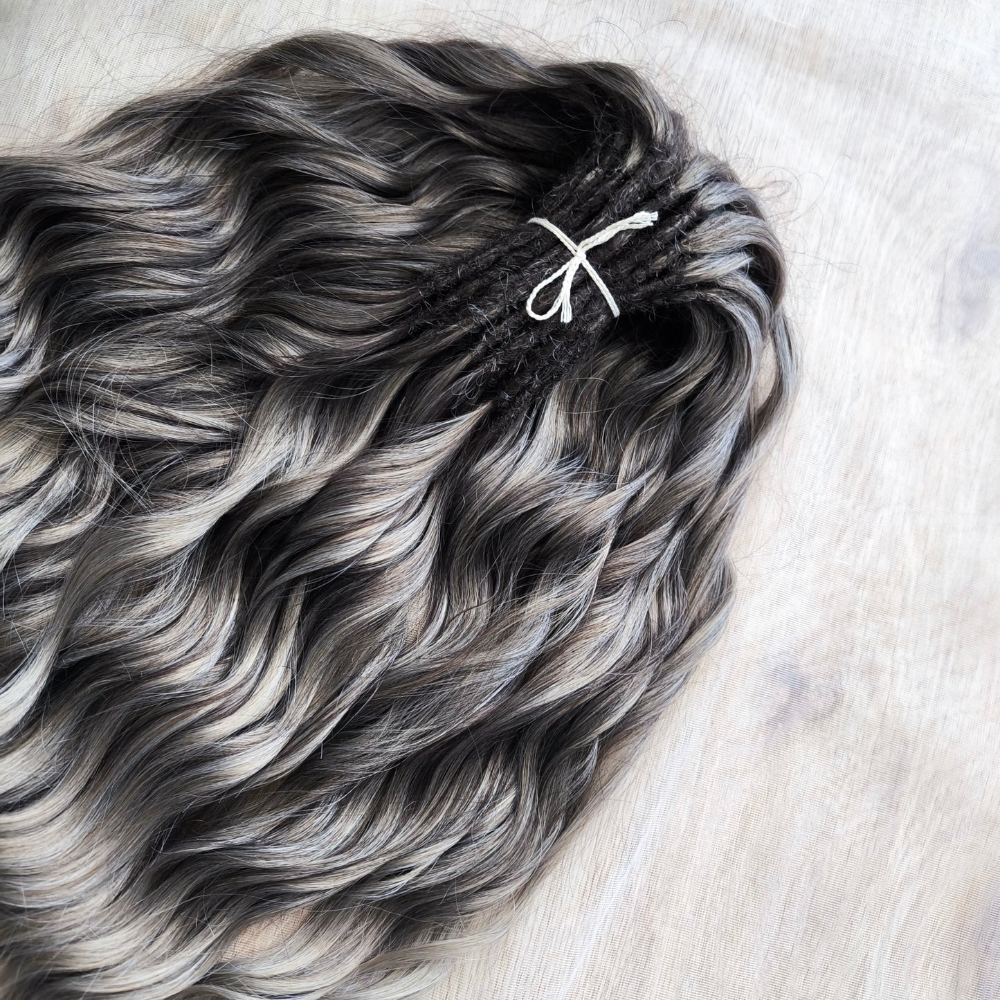 Ash ombre from light brown to wheat blonde soft, lightweight, and reusable synthetic brushable double ended wavy dreadlocks (regular dreaded, braided middle or push-up).