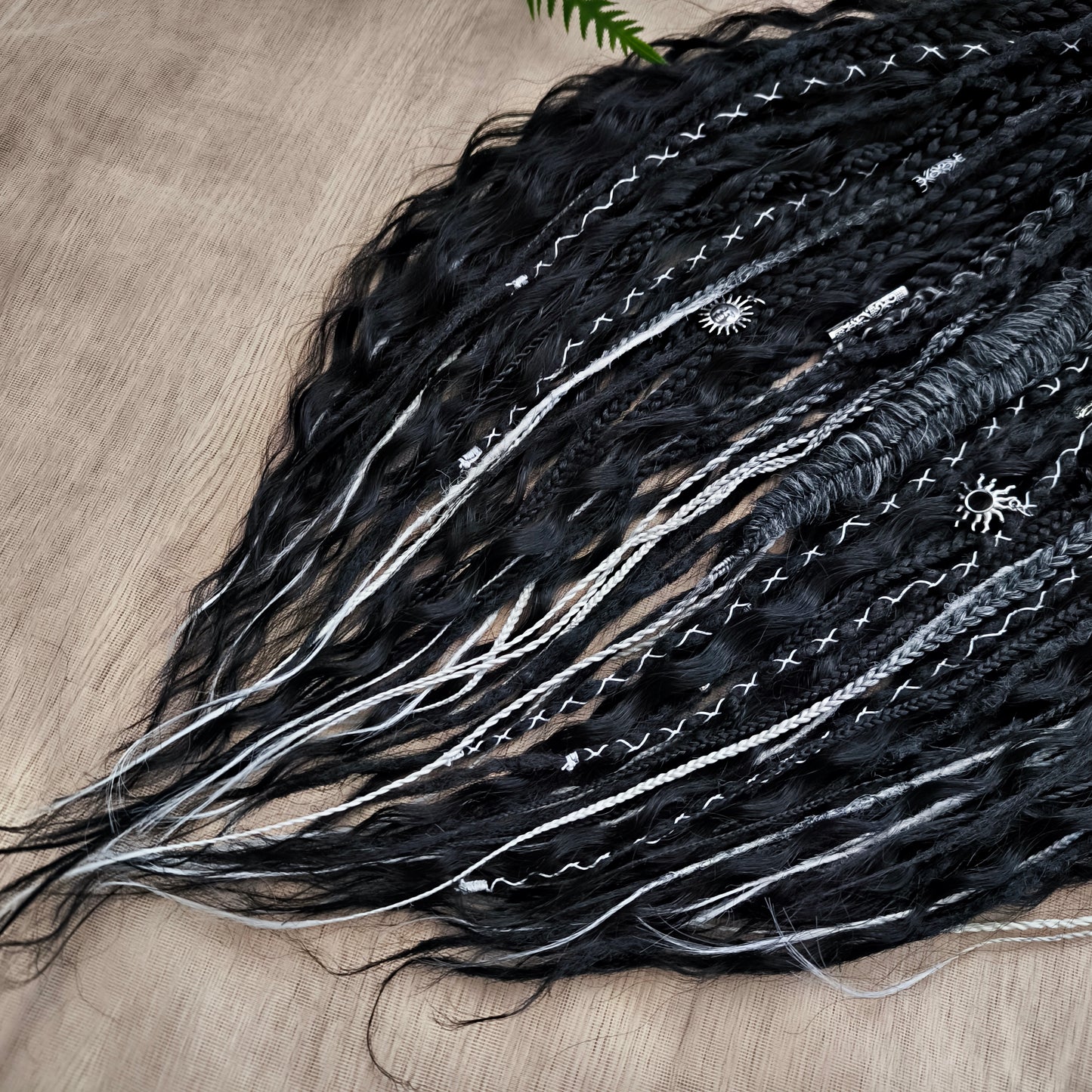 Pagan Witch — black, gray, and white/blonde set of 55 double ended synthetic bumpy dreads, braids, Senegalese twist, and dreaded curls (decoration is included). Reusable lightweight set made from high-quality synthetic hypoallergenic material kanekalon.
Standard length: ±22-24 inches (55-60 cm)
Thickness of dreads and braids: ±0.6-0.8 cm
Dreaded part of curls ±3-4 inches (8-10 cm)
Weight with decoration: ±310 gr (11 oz)