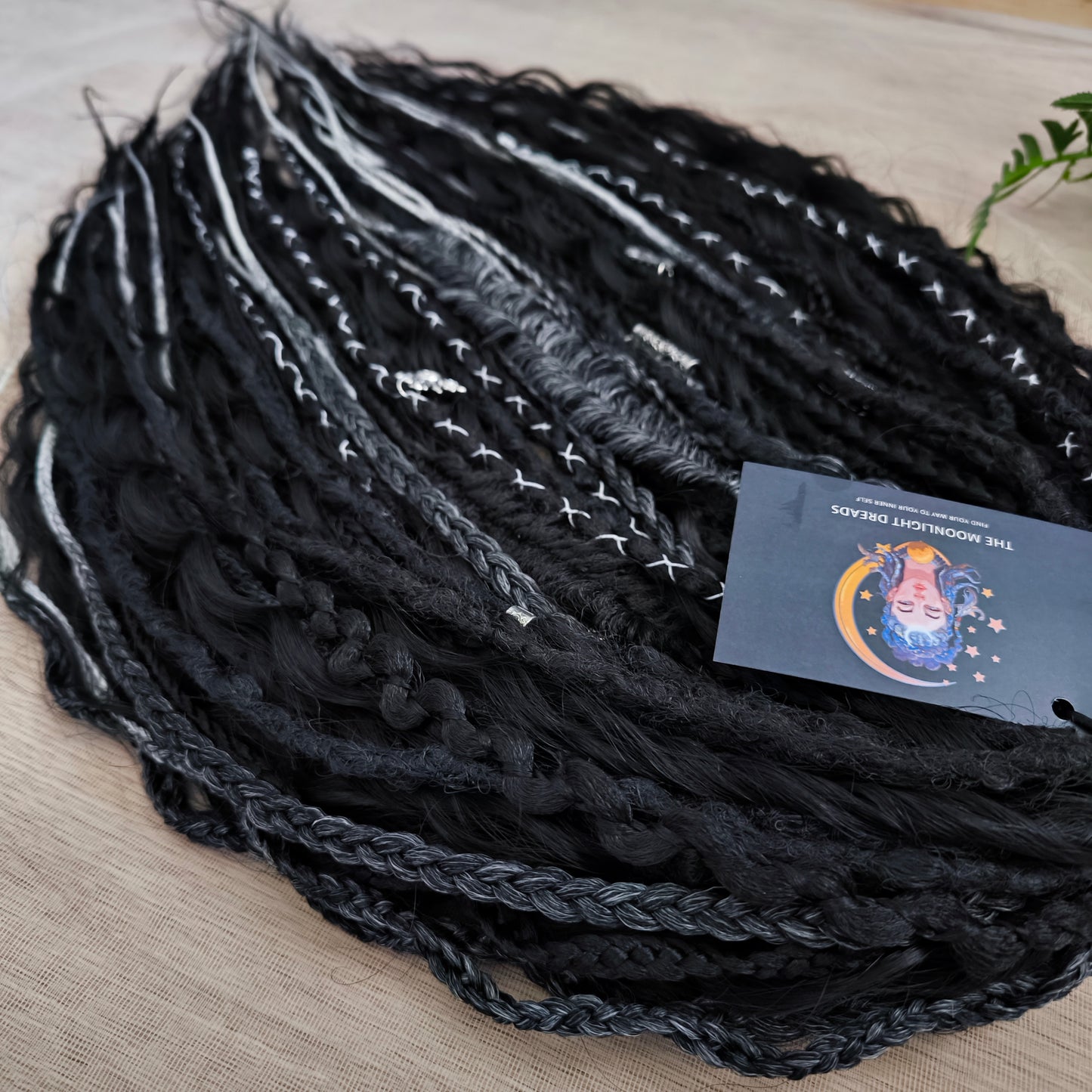 Pagan Witch — black, gray, and white/blonde set of 55 double ended synthetic bumpy dreads, braids, Senegalese twist, and dreaded curls (decoration is included). Reusable lightweight set made from high-quality synthetic hypoallergenic material kanekalon.
Standard length: ±22-24 inches (55-60 cm)
Thickness of dreads and braids: ±0.6-0.8 cm
Dreaded part of curls ±3-4 inches (8-10 cm)
Weight with decoration: ±310 gr (11 oz)