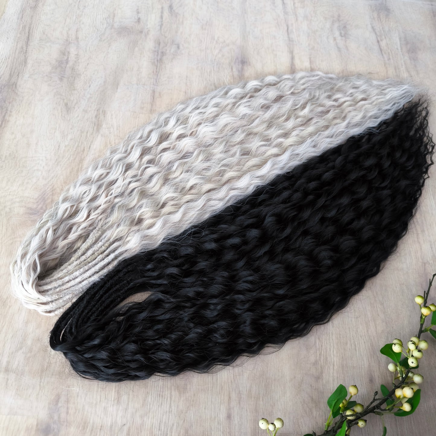 Black and white/blonde set of 62 double ended synthetic non-brushable dreaded curls.
Length: ±28-30 inches (70-75 cm)
Dreaded part of curls ±3-4 inches (8-10 cm)
Weight: ±420 gr (15 oz)