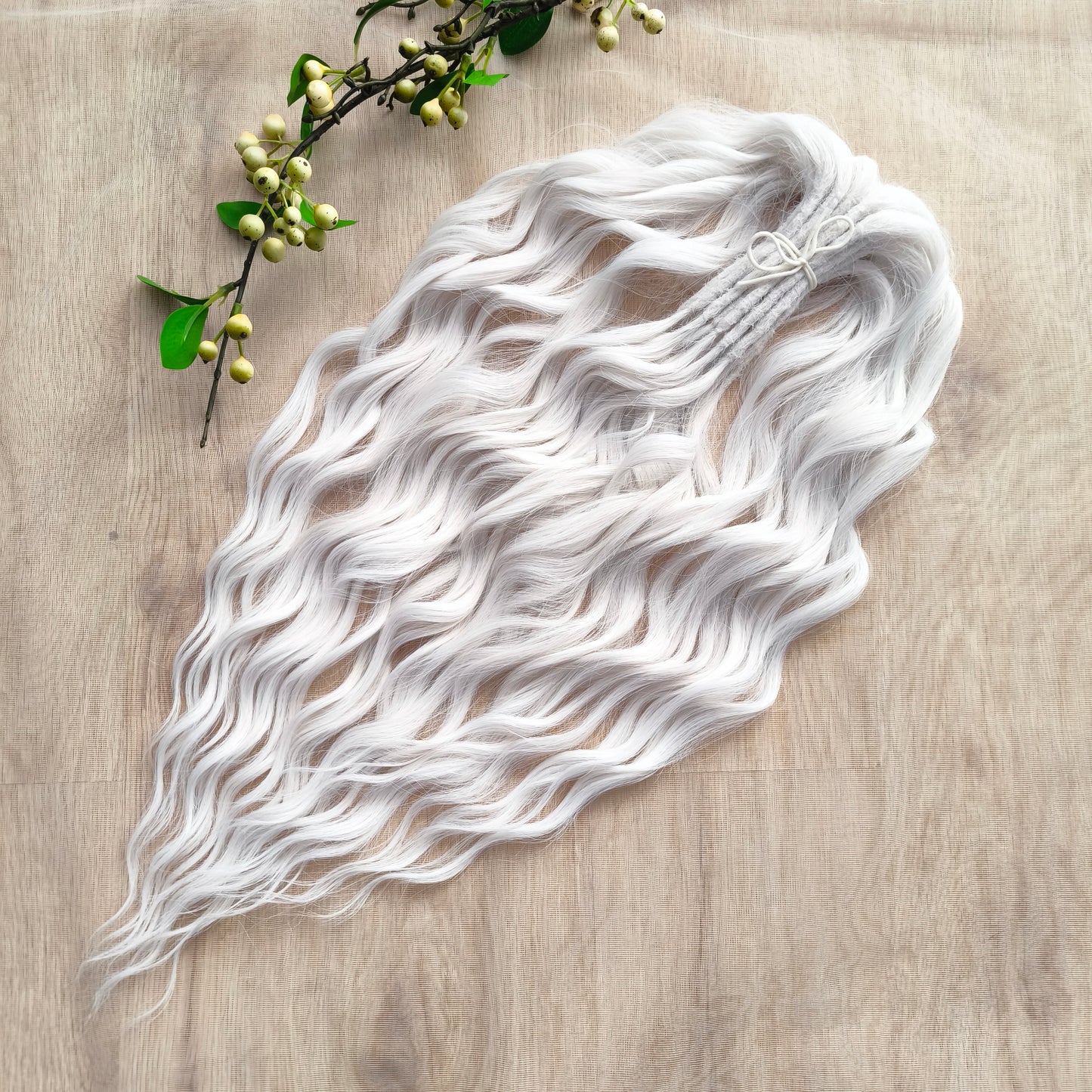 Snow-white soft, lightweight, and reusable synthetic brushable double ended wavy dreadlocks (regular dreaded, braided middle, or push-up).