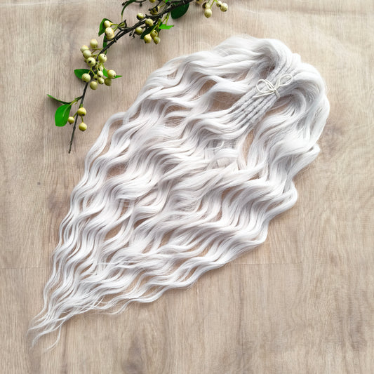Snow-white soft, lightweight, and reusable synthetic brushable double ended wavy dreadlocks (regular dreaded, braided middle, or push-up).