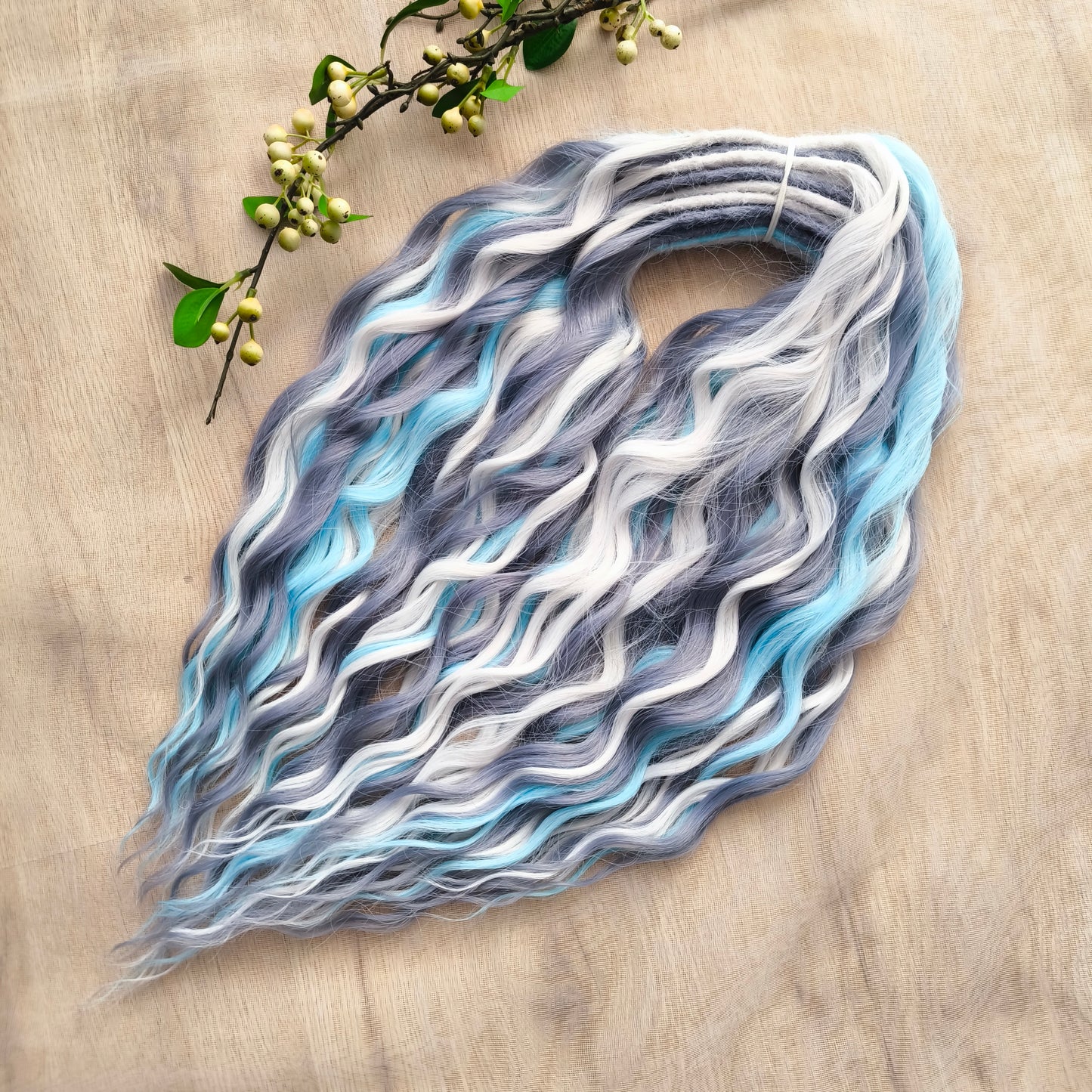 Let your hair channel the raw beauty of the Arctic with this striking icy blend. Arctic Ice features cool-toned waves in glacier blue, soft white, and smoky gray, flowing together like frozen mist over a winter sea.
Elegant, bold, and ethereal — this set is perfect for anyone who loves a crisp, dramatic look with an icy twist.