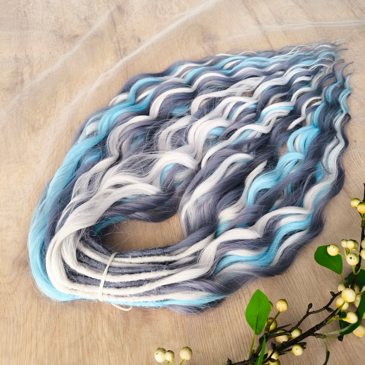 Let your hair channel the raw beauty of the Arctic with this striking icy blend. Arctic Ice features cool-toned waves in glacier blue, soft white, and smoky gray, flowing together like frozen mist over a winter sea.
Elegant, bold, and ethereal — this set is perfect for anyone who loves a crisp, dramatic look with an icy twist.