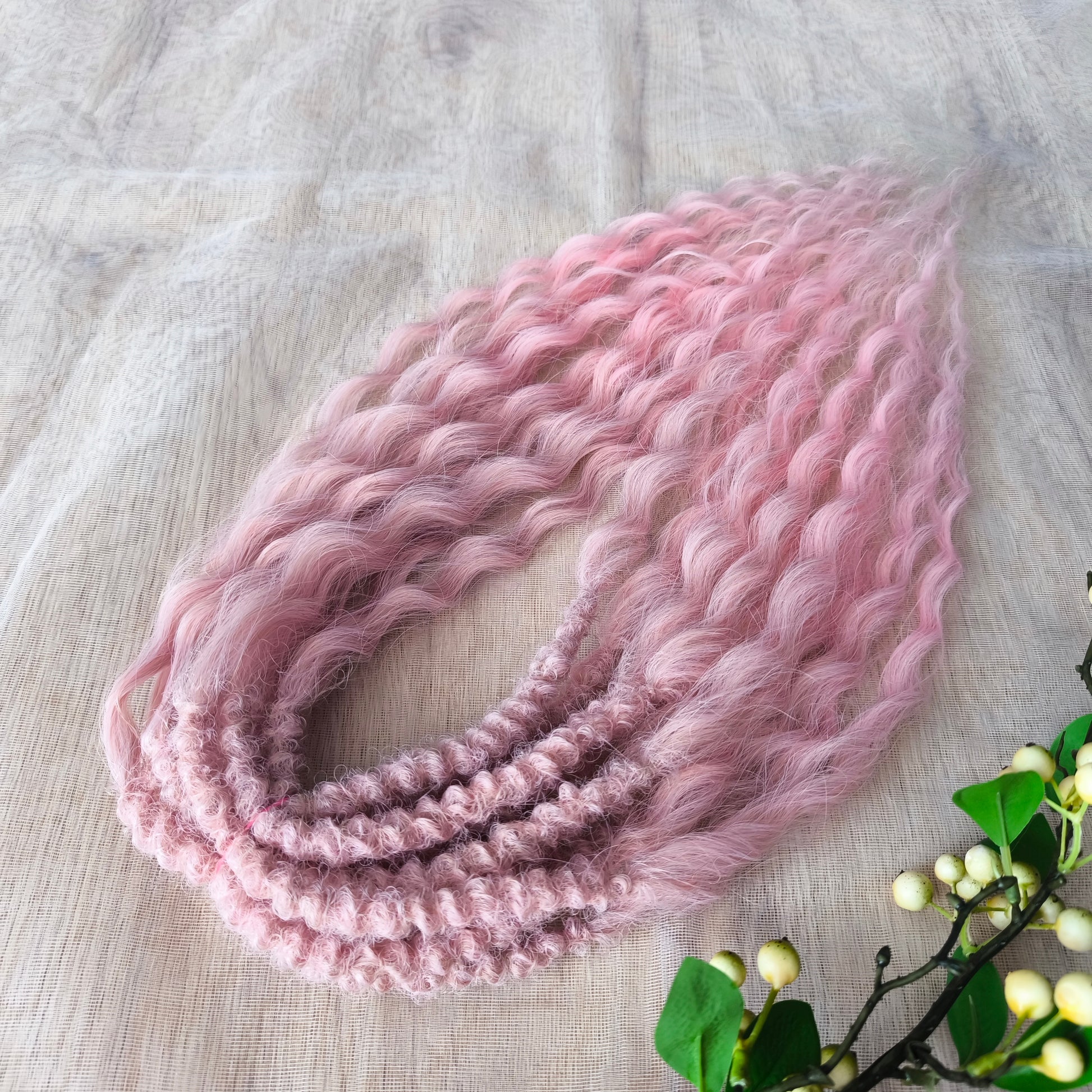 Dusty Rose features a soft pink ombré that fades beautifully from ash dusty rose roots to clean, pastel pink ends. The subtle gradient adds depth and a natural look, while maintaining a romantic, feminine tone.