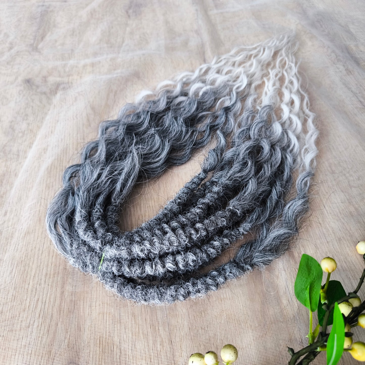 Salt and pepper: ombre from grey to white soft, lightweight, and reusable synthetic brushable double ended wavy dreadlocks (NOT BRUSHABLE).
The length:
Standard dreaded - 22-24 inches (55-60 cm), dreaded part ±3-4 inches
Push-up / Dolly - 20-22 inches (50-55 cm), dreaded part ±4 inches