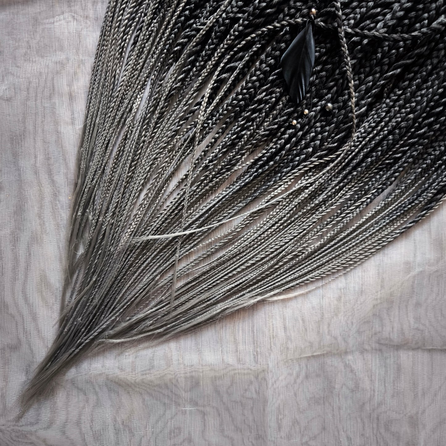 The set of 57 double ended synthetic braids and Senegalese twists ombre from black to grey "Graffit"
Standard length: 22-24 inches (55-60 cm)
Thickness of braids: ~0.8-1 cm