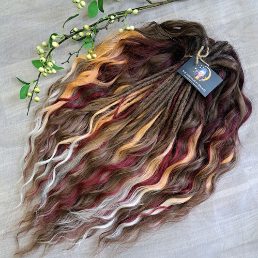 Autumn Garnet Smoke is a variation of the popular Autumn Smoke set with the addition of rich burgundy strands. Inspired by the richness of autumn and the depth of garnet, this set combines warm smoky browns and golden tones with bold burgundy accents. The blend creates a look that is both elegant and powerful, perfect for those who want to highlight their individuality with a touch of autumn mystery.