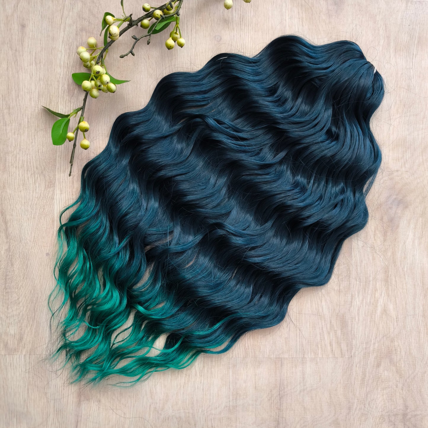Midnight Teal to Emerald Fade soft, lightweight, and reusable synthetic brushable double ended wavy dreadlocks.