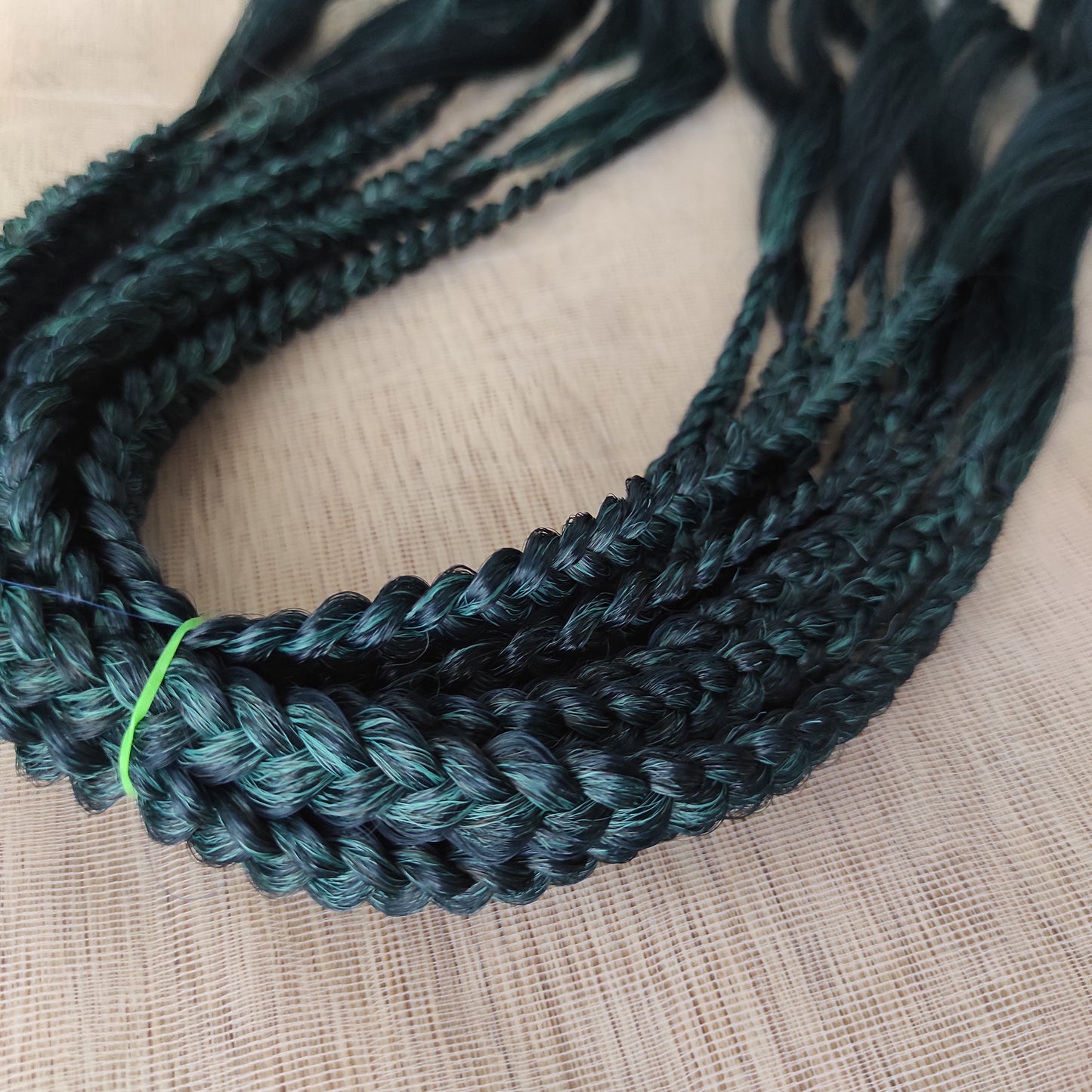 Midnight Teal to Emerald Fade soft, lightweight, and reusable synthetic brushable double ended wavy dreadlocks.