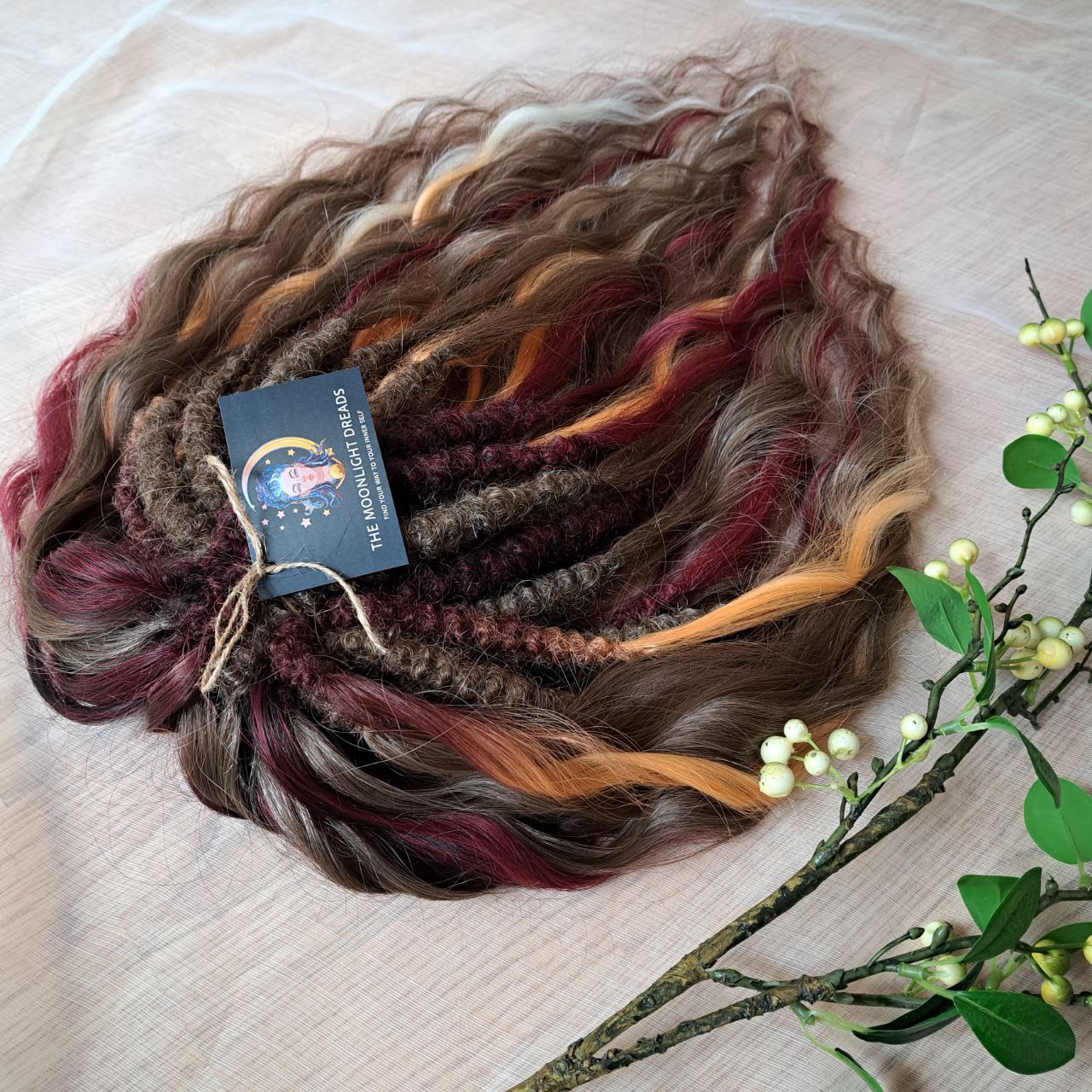 Autumn Garnet Smoke is a variation of the popular Autumn Smoke set with the addition of rich burgundy strands. Inspired by the richness of autumn and the depth of garnet, this set combines warm smoky browns and golden tones with bold burgundy accents. The blend creates a look that is both elegant and powerful, perfect for those who want to highlight their individuality with a touch of autumn mystery.