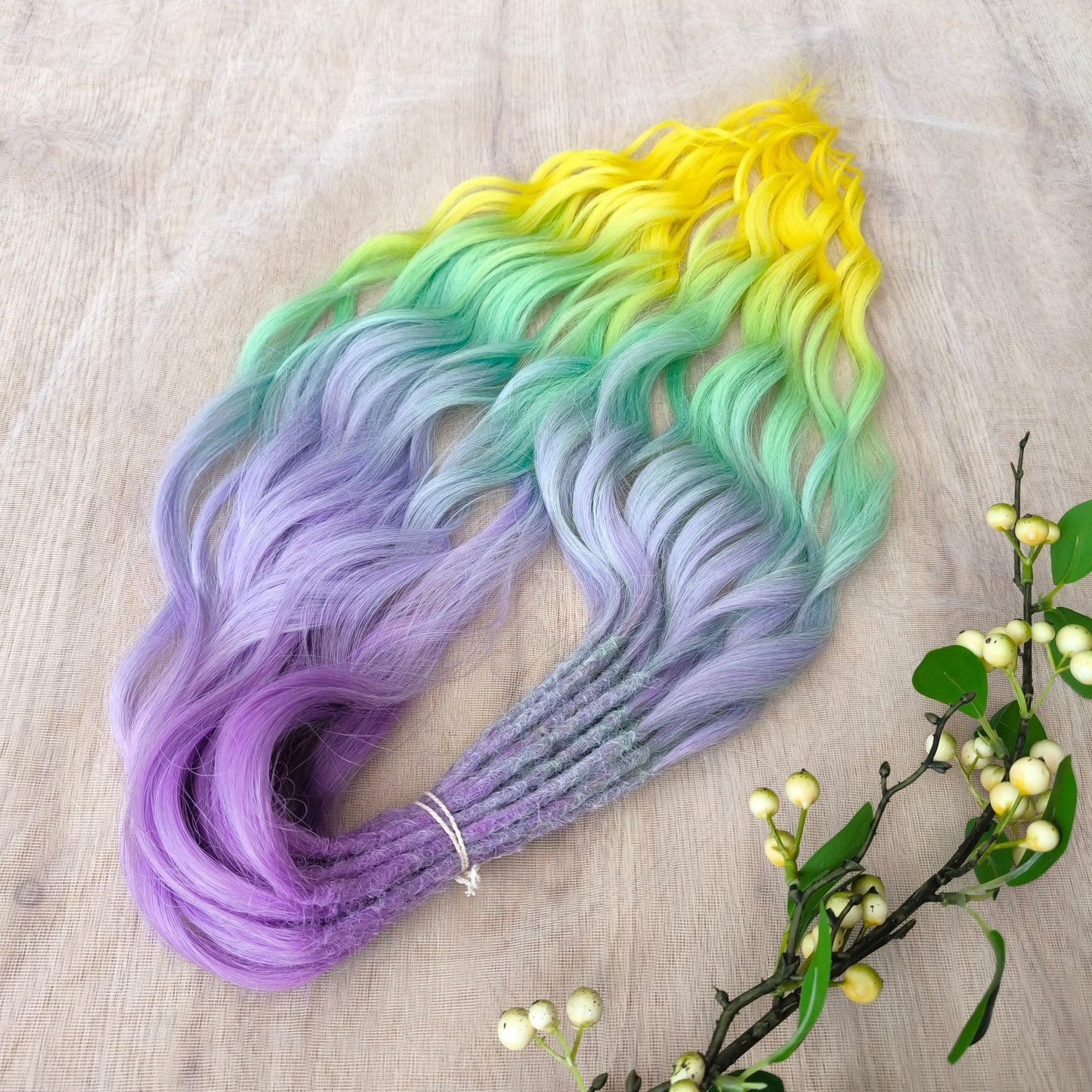 Colorful Rainbow prism (ombre from purple to green and yellow), soft, lightweight, and reusable synthetic sets of wavy double ended brushable dreadlocks (regular dreaded or push-up).