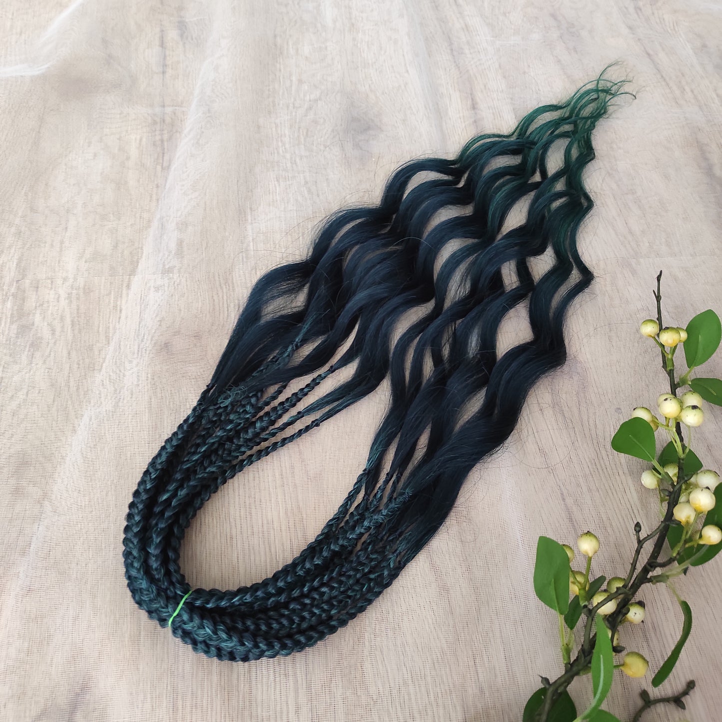 Midnight Teal to Emerald Fade soft, lightweight, and reusable synthetic brushable double ended wavy dreadlocks.