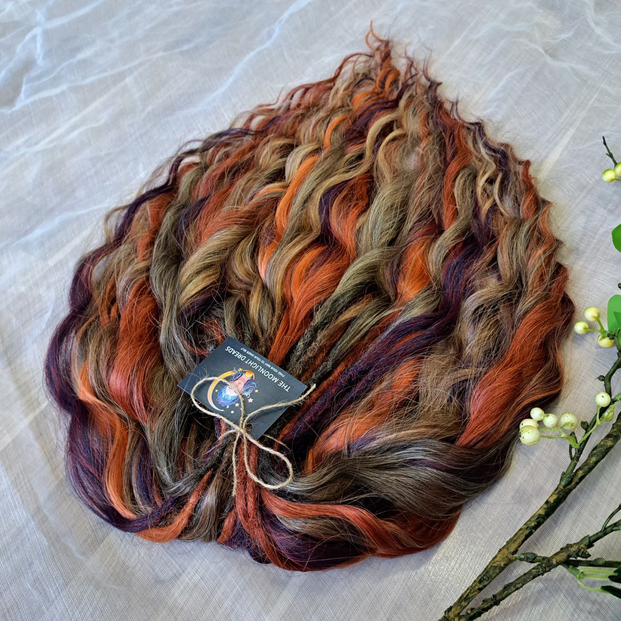 warm and rich, this set combines five carefully chosen shades: brown mixed with soft hazelnut brown, while fiery copper and golden auburn tones bring glowing warmth. A final touch of hand-blended plum purple adds contrast and mystery, completing this striking multi-tone mix.