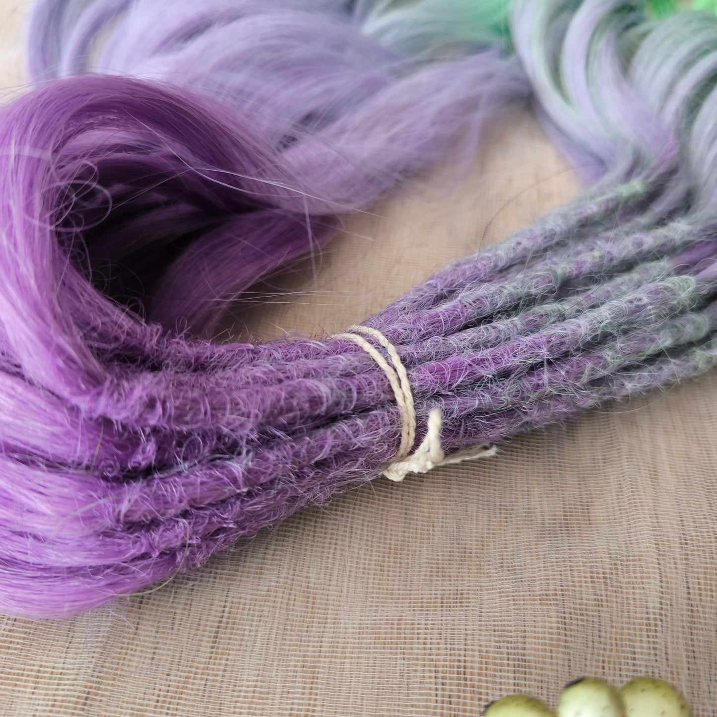 Colorful Rainbow prism (ombre from purple to green and yellow), soft, lightweight, and reusable synthetic sets of wavy double ended brushable dreadlocks (regular dreaded or push-up).