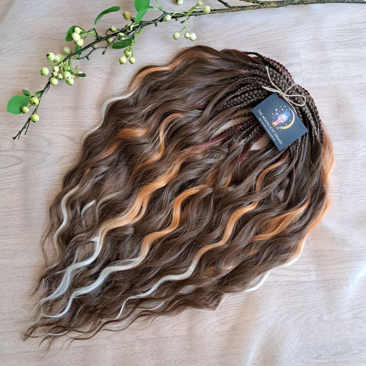 This moody, elegant set of soft, lightweight, and reusable synthetic brushable double-ended wavy dreadlocks features 2 shades of brown as the main color, enriched with calico strands.