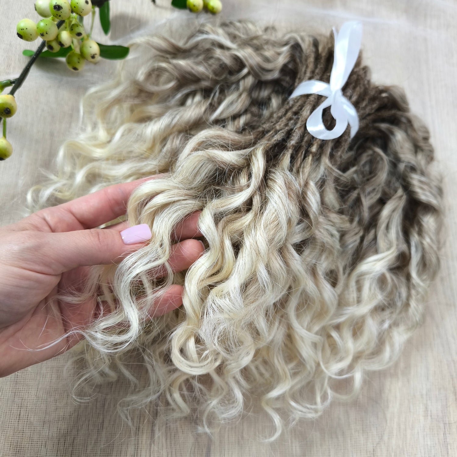 Short-length synthetic curls (10 inches - 25 cm) — perfect for a light and easy style. Comfortable, handmade, and beautiful. Ships worldwide.