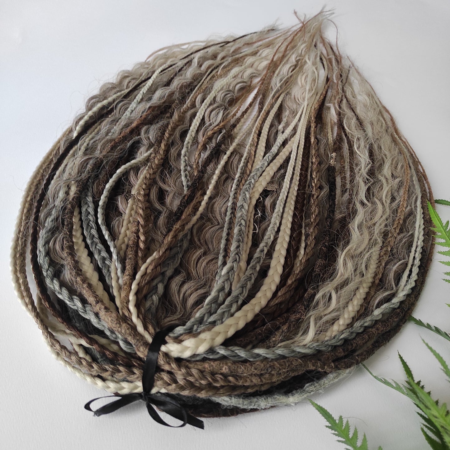 A mix of browns and ash blonde - lightweight,  reusable synthetic double ended crochet dreadlocks, non-brushable curls, braids, and Senegalese twists.
