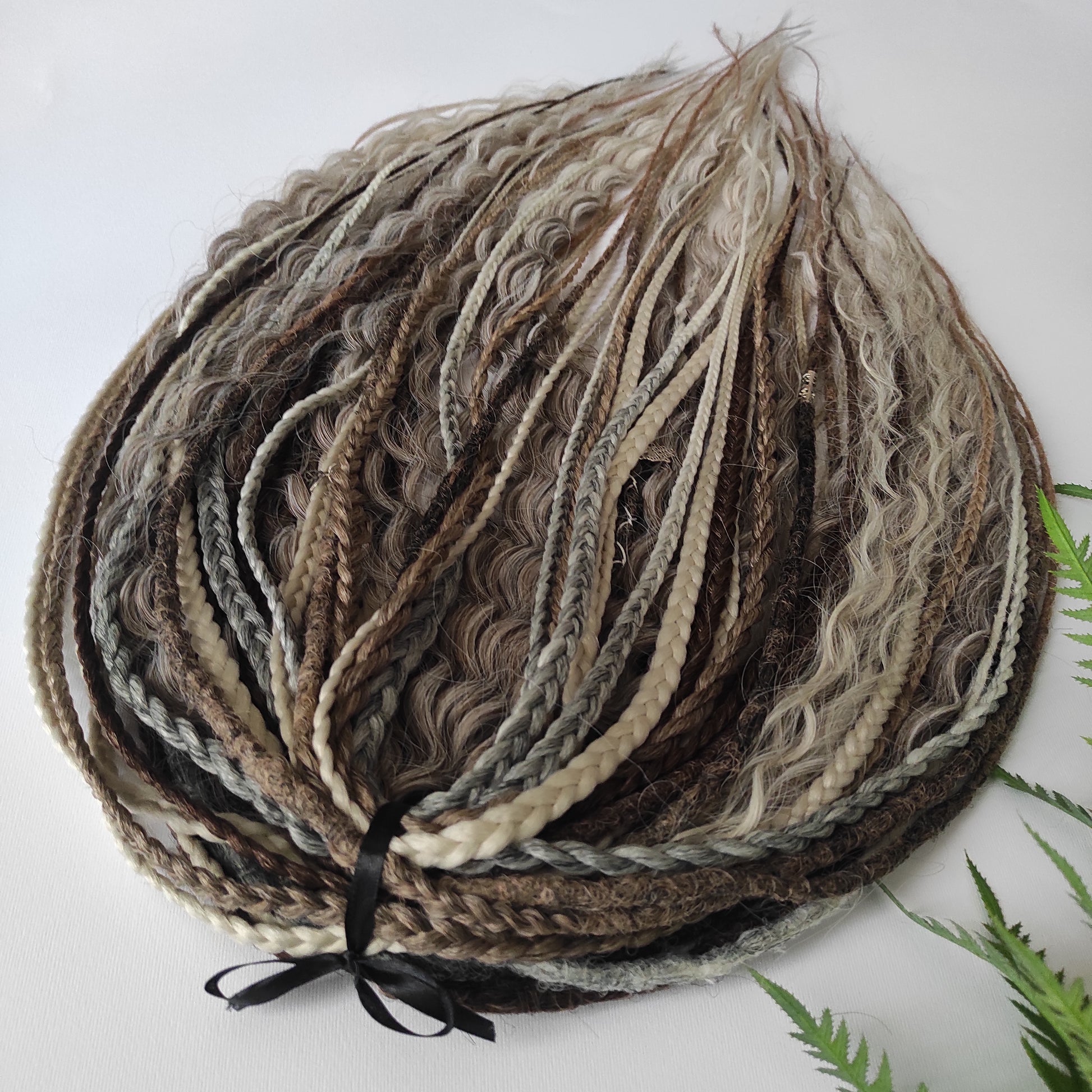 A mix of browns and ash blonde - lightweight,  reusable synthetic double ended crochet dreadlocks, non-brushable curls, braids, and Senegalese twists.
