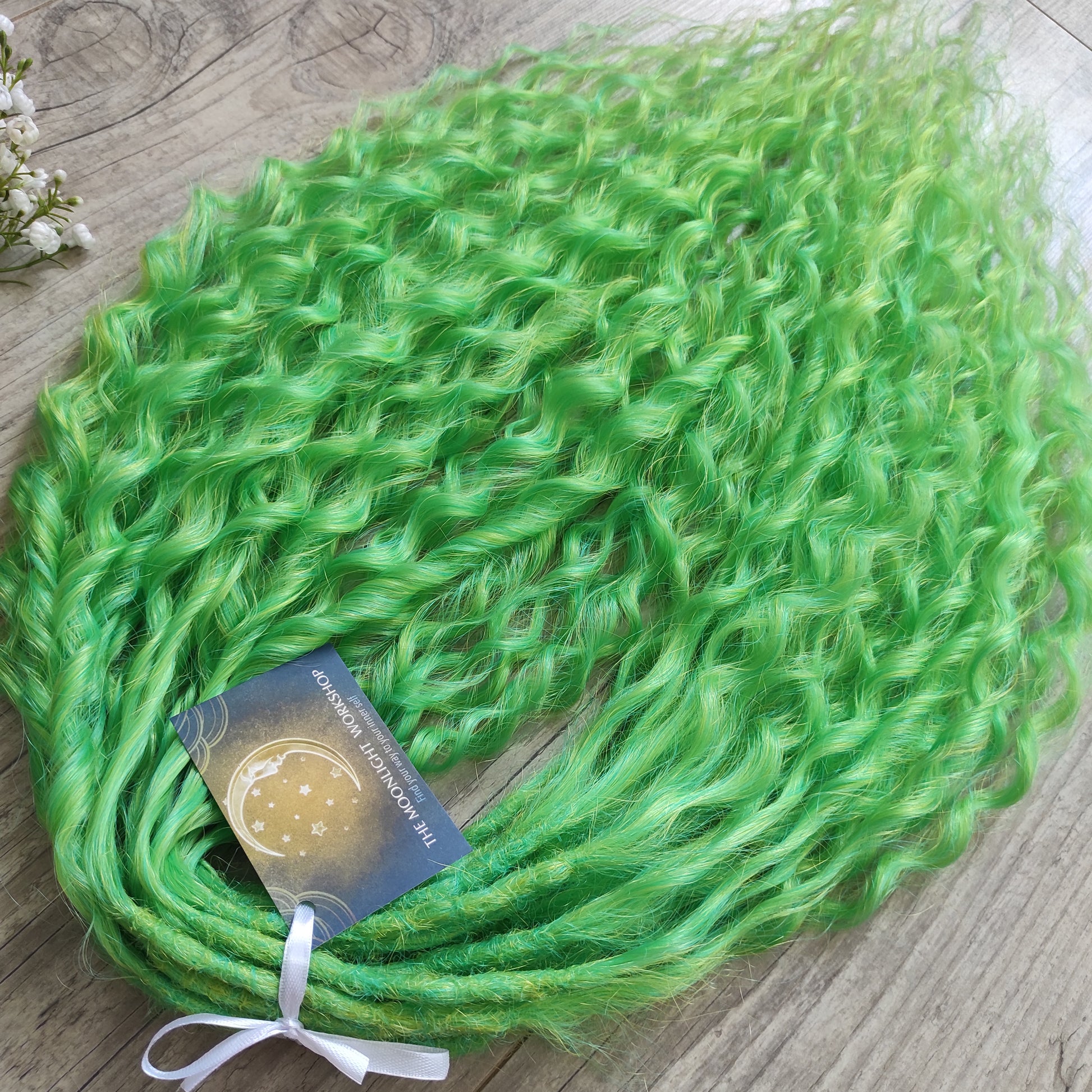 Bright lime green with subtle golden undertones - soft, lightweight, and reusable synthetic sets of double ended regular curls (NOT BRUSHABLE). It’s bold but not harsh — a vibrant, cheerful tone that instantly stands out while staying balanced and wearable. Perfect for creating eye-catching looks with natural brightness and energy.

The length:
Standard dreaded - 22-24 inches (55-60 cm), dreaded part `3-4 inches
Push-up / Dolly - 20-22 inches (50-55 cm), dreaded part `4 inches