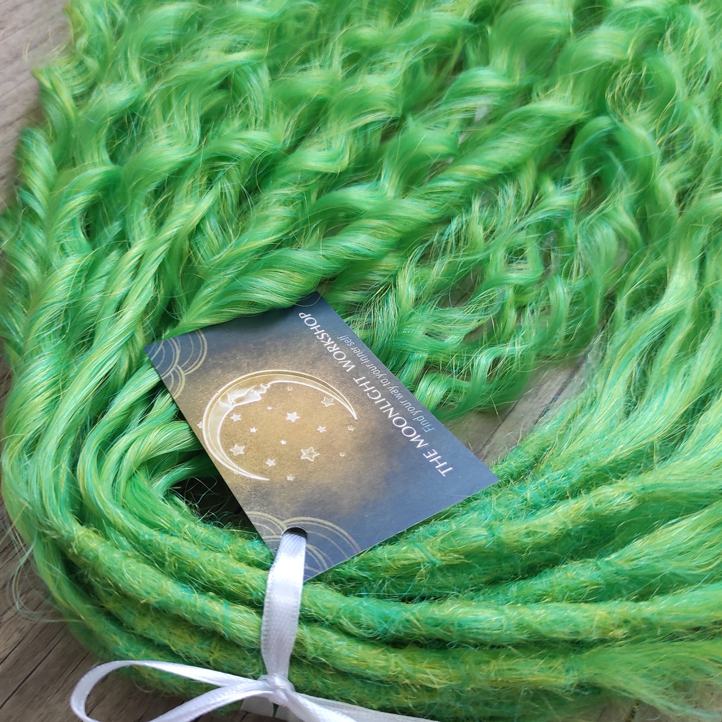 Bright lime green with subtle golden undertones - soft, lightweight, and reusable synthetic sets of double ended regular curls (NOT BRUSHABLE). It’s bold but not harsh — a vibrant, cheerful tone that instantly stands out while staying balanced and wearable. Perfect for creating eye-catching looks with natural brightness and energy.

The length:
Standard dreaded - 22-24 inches (55-60 cm), dreaded part `3-4 inches
Push-up / Dolly - 20-22 inches (50-55 cm), dreaded part `4 inches