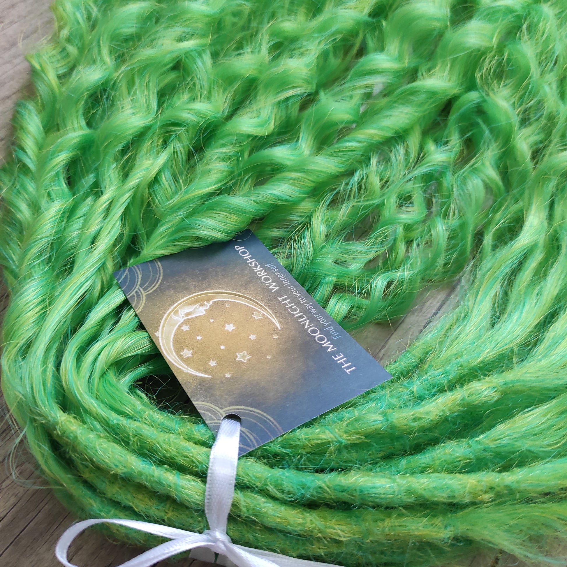 Bright lime green with subtle golden undertones - soft, lightweight, and reusable synthetic sets of double ended regular curls (NOT BRUSHABLE). It’s bold but not harsh — a vibrant, cheerful tone that instantly stands out while staying balanced and wearable. Perfect for creating eye-catching looks with natural brightness and energy.

The length:
Standard dreaded - 22-24 inches (55-60 cm), dreaded part `3-4 inches
Push-up / Dolly - 20-22 inches (50-55 cm), dreaded part `4 inches
