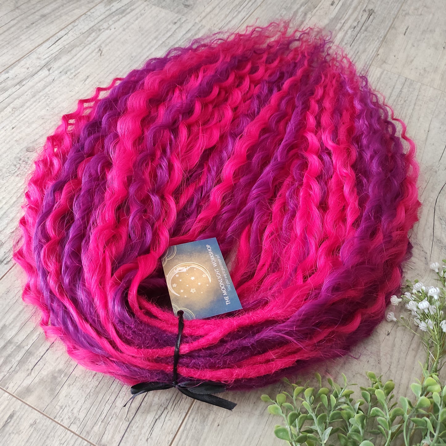 Neon Rose - soft, lightweight, and reusable synthetic set double ended regular curls (NON-BRUSHABLE) in hot fuchsia pink and magenta colours.

The length:
Standard dreaded - 22-24 inches (55-60 cm), dreaded part ±4-5 inches
Push-up / Dolly - 20-22 inches (50-55 cm), dreaded part ±4 inches (from working side).