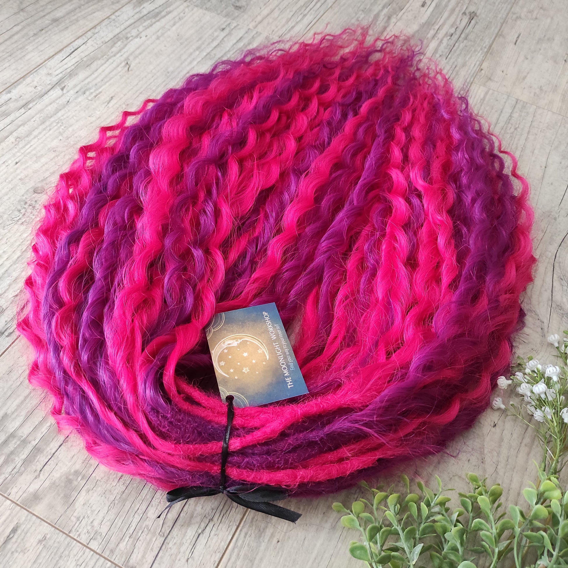 Neon Rose - soft, lightweight, and reusable synthetic set double ended regular curls (NON-BRUSHABLE) in hot fuchsia pink and magenta colours.

The length:
Standard dreaded - 22-24 inches (55-60 cm), dreaded part ±4-5 inches
Push-up / Dolly - 20-22 inches (50-55 cm), dreaded part ±4 inches (from working side).