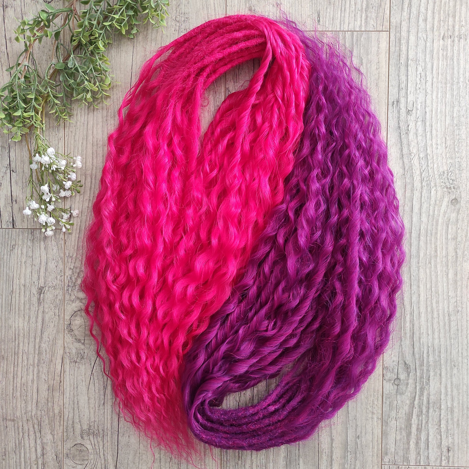 Neon Rose - soft, lightweight, and reusable synthetic set double ended regular curls (NON-BRUSHABLE) in hot fuchsia pink and magenta colours.

The length:
Standard dreaded - 22-24 inches (55-60 cm), dreaded part ±4-5 inches
Push-up / Dolly - 20-22 inches (50-55 cm), dreaded part ±4 inches (from working side).