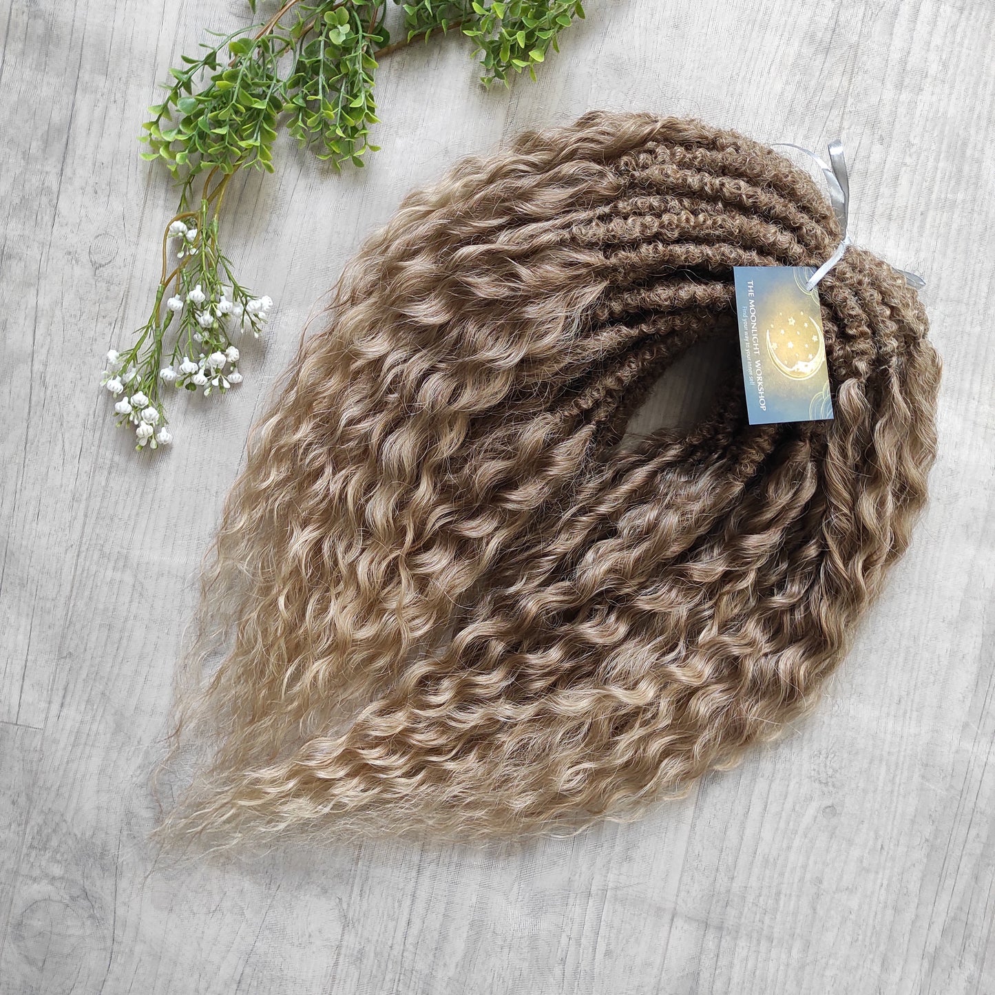 Ombre natural golden honey wheat blonde soft, lightweight, and reusable synthetic brushable double ended wavy dreadlocks (NOT BRUSHABLE).

The length:
Standard dreaded - 22-24 inches (55-60 cm), dreaded part ±3-4 inches
Push-up / Dolly - 20-22 inches (50-55 cm), dreaded part ±4 inches