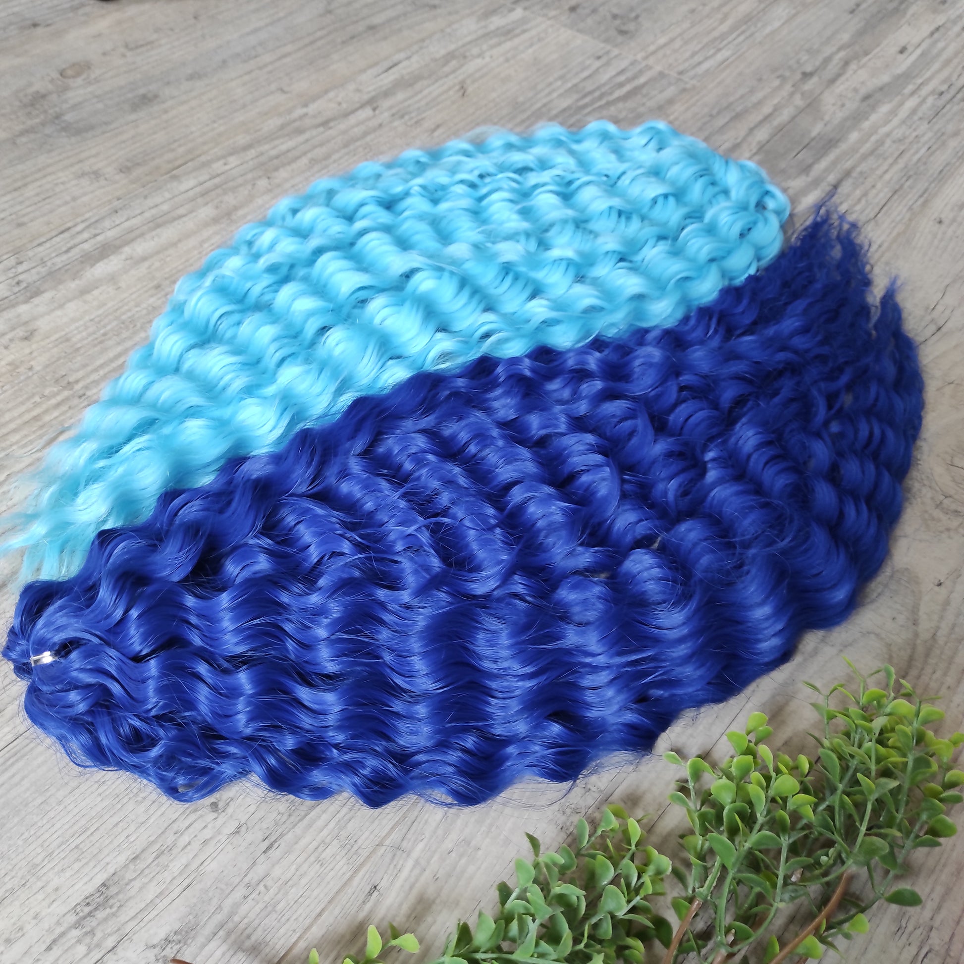 Soft, lightweight, and reusable synthetic sets of double ended regular curls (NOT BRUSHABLE) in blue shades:

1. sky blue;
2. deep blue;

The length:
Standard dreaded - 22-24 inches (55-60 cm), dreaded part `3-4 inches
Push-up / Dolly - 20-22 inches (50-55 cm), dreaded part `4 inches (from working side)