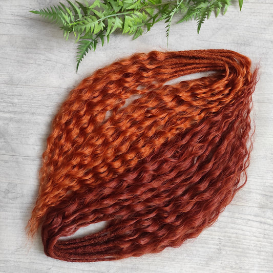 Soft, lightweight, and reusable synthetic sets of double ended regular curls (NOT BRUSHABLE) in red shades:

1. copper;
2. auburn/bronze;