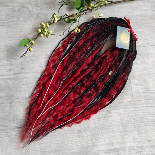 Red Queen - soft, lightweight, and reusable double ended braids, Senegalese twists, and non-brushable dreaded curls in vibrant red, and grey-to-white ombre colors.