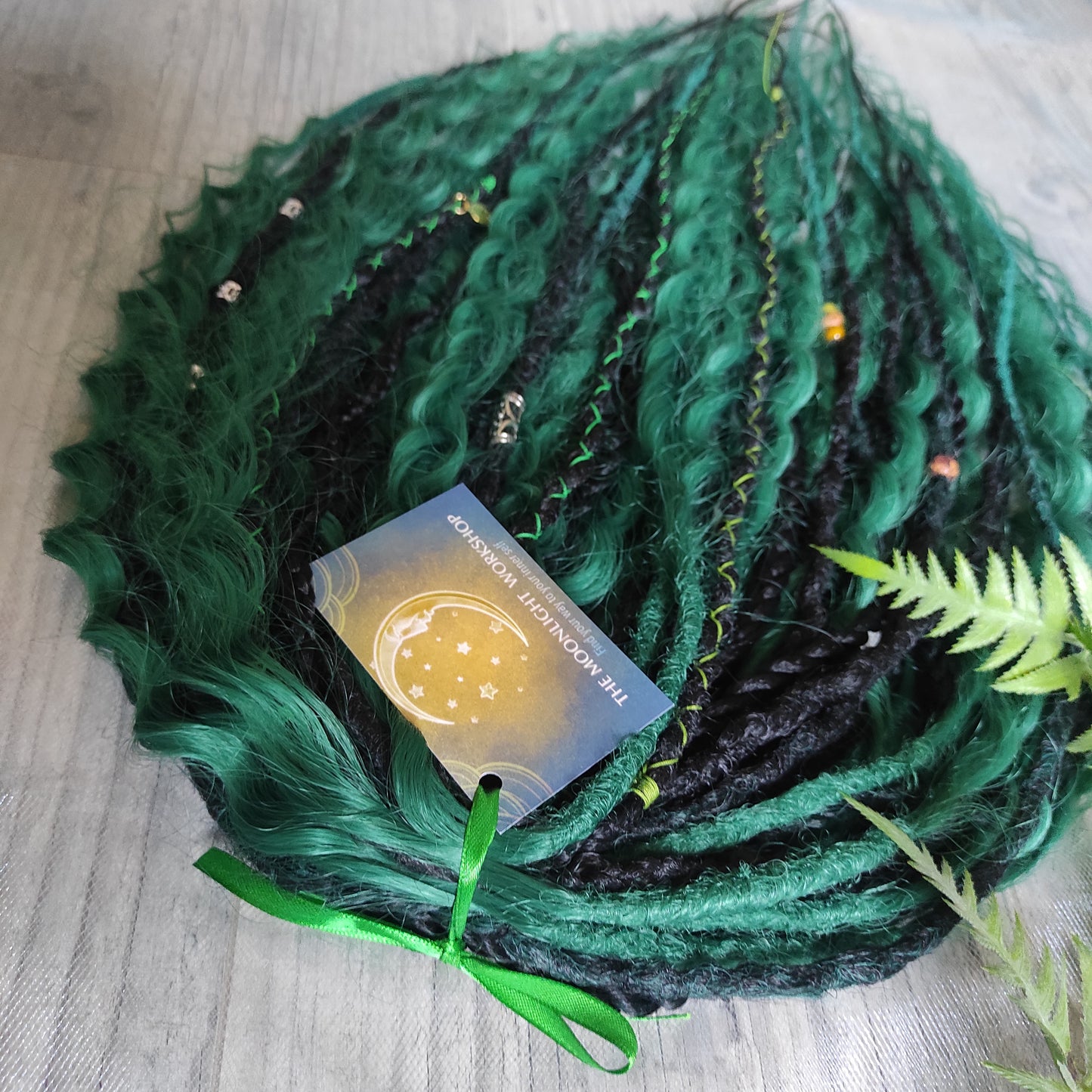 "Deep forest" - Black and emerald synthetic set of double ended crochet textured dreadlocks, various braids, Senegalese twists, and dreaded curls.

Standard length: ±22-24 inches (55-60 cm)
Thickness of dreads and braids: ±0.6-0.8 cm
Dreaded part of curls ±4-5 inches (10-12 cm)
