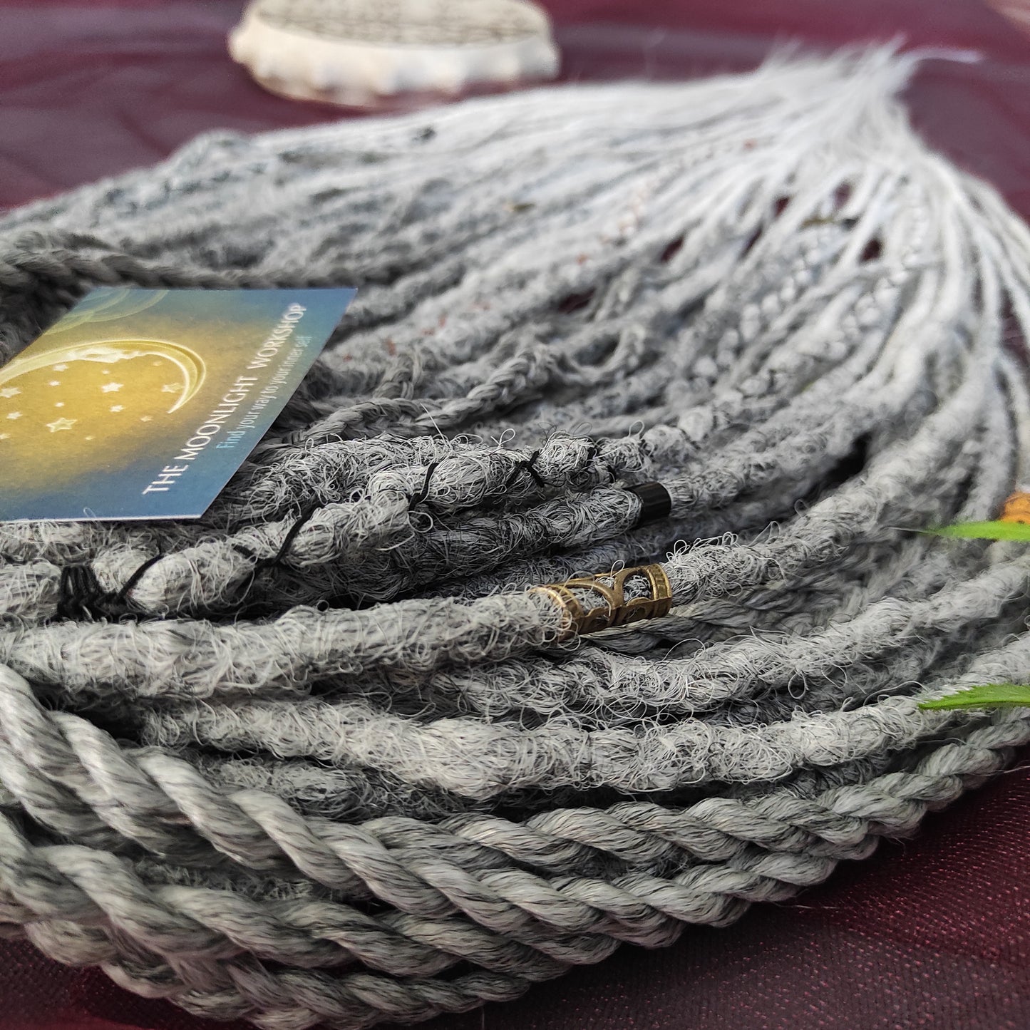 This set of synthetic dreadlocks combines elements of a Viking-inspired aesthetic.
Ombre from grey to platinum blonde double ended crochet dreads, braids, and Senegalese twists. Decoration is included. Reusable lightweight set made from high-quality synthetic hypoallergenic material kanekalon.

Standard length: ±22-24 inches (55-60 cm)
Thickness of dreads and braids: ±0.8 cm
