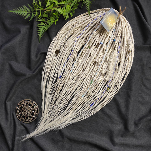 This set of synthetic dreadlocks combines elements of a Viking-inspired aesthetic.
Scandinavian blonde double ended crochet bumpy dreads, braids, and Senegalese twists. Decoration is included. Reusable lightweight set made from high-quality synthetic hypoallergenic material kanekalon.

Standard length: ±22-24 inches (55-60 cm)
Thickness of dreads and braids: ±0.8 cm