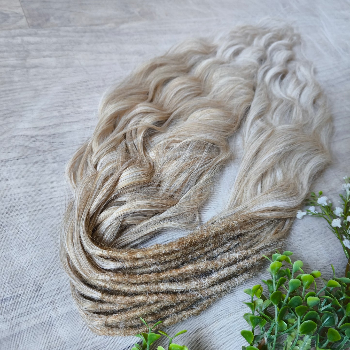 Ombre from warm blonde to platinum blonde soft, lightweight, and reusable synthetic brushable double ended wavy dreadlocks (regular dreaded, braided middle, or push-up).


The length:
Standard dreaded - 22-24 inches (55-60 cm), dreaded part ±4-5 inches
Braided middle - 22-24 inches (55-60 cm), braid ±4-5 inches folded (total ±8-10 inches)
Push-up / Dolly - 20-22 inches (50-55 cm), dreaded part ±4 inches (from working side)