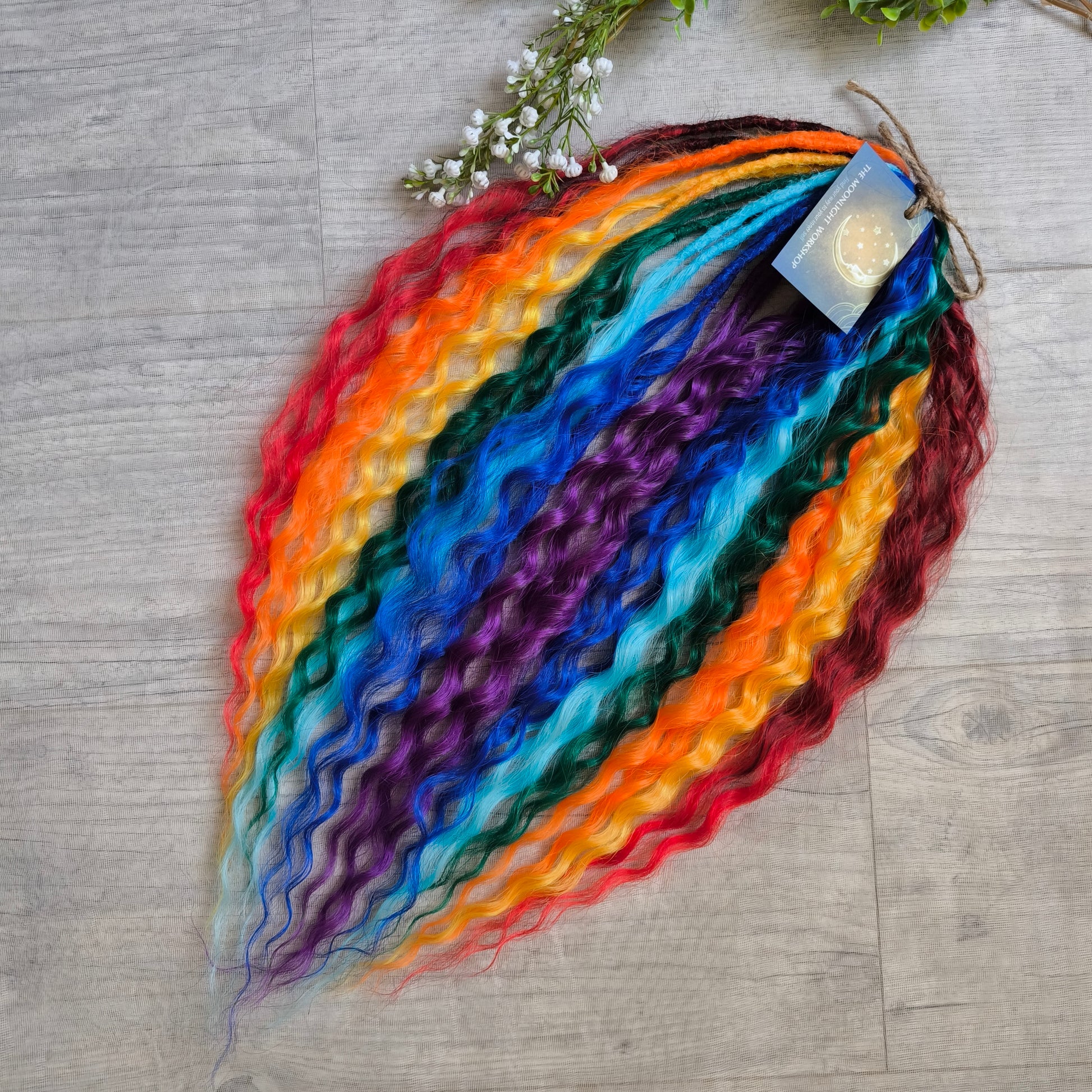 Rainbow: red, orange, yellow, green, light and dark blue, purple - soft, lightweight, and reusable synthetic DE regular curls (NOT BRUSHABLE). This set is a great colorful accent to any of your sets (curls or dreads).

The length:
Standard dreaded - 22-24 inches (55-60 cm), dreaded part ±4-5 inches
Push-up / Dolly - 20-22 inches (50-55 cm), dreaded part ±4 inches (from working side).
