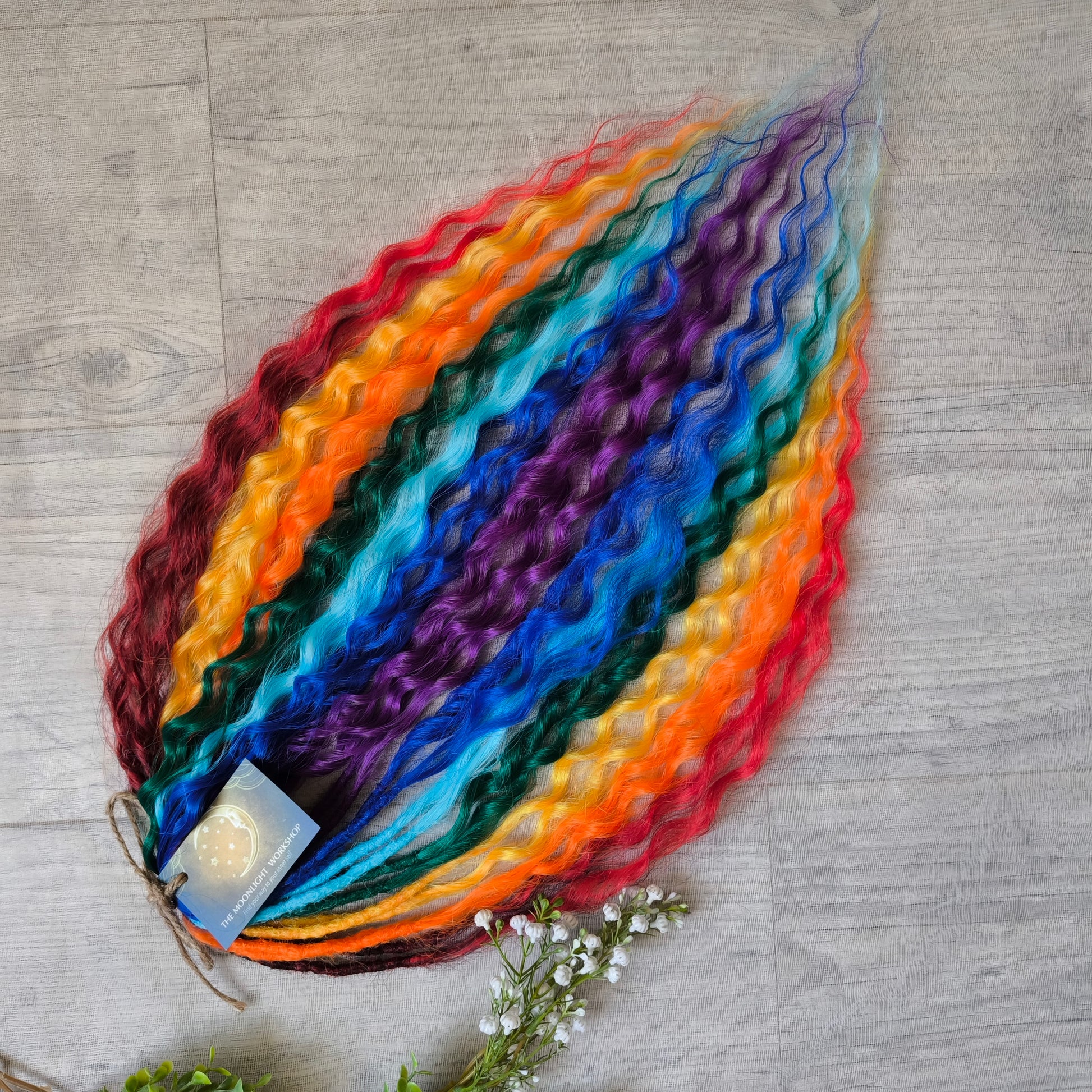 Rainbow: red, orange, yellow, green, light and dark blue, purple - soft, lightweight, and reusable synthetic DE regular curls (NOT BRUSHABLE). This set is a great colorful accent to any of your sets (curls or dreads).

The length:
Standard dreaded - 22-24 inches (55-60 cm), dreaded part ±4-5 inches
Push-up / Dolly - 20-22 inches (50-55 cm), dreaded part ±4 inches (from working side).