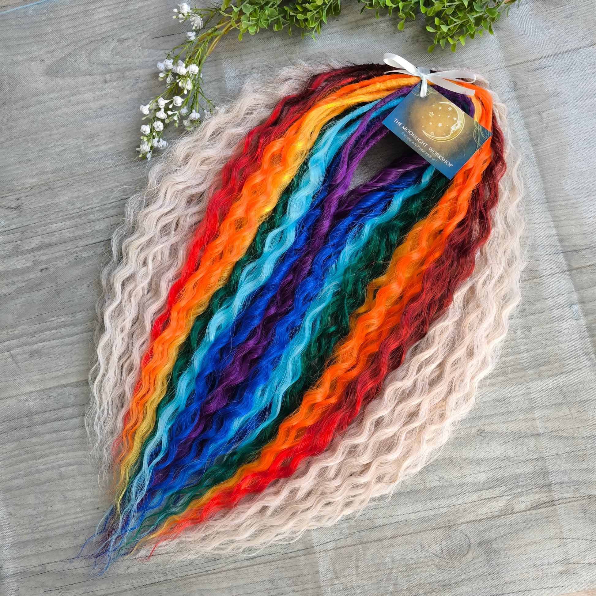 Rainbow: red, orange, yellow, green, light and dark blue, purple - soft, lightweight, and reusable synthetic DE regular curls (NOT BRUSHABLE). This set is a great colorful accent to any of your sets (curls or dreads).

The length:
Standard dreaded - 22-24 inches (55-60 cm), dreaded part ±4-5 inches
Push-up / Dolly - 20-22 inches (50-55 cm), dreaded part ±4 inches (from working side).