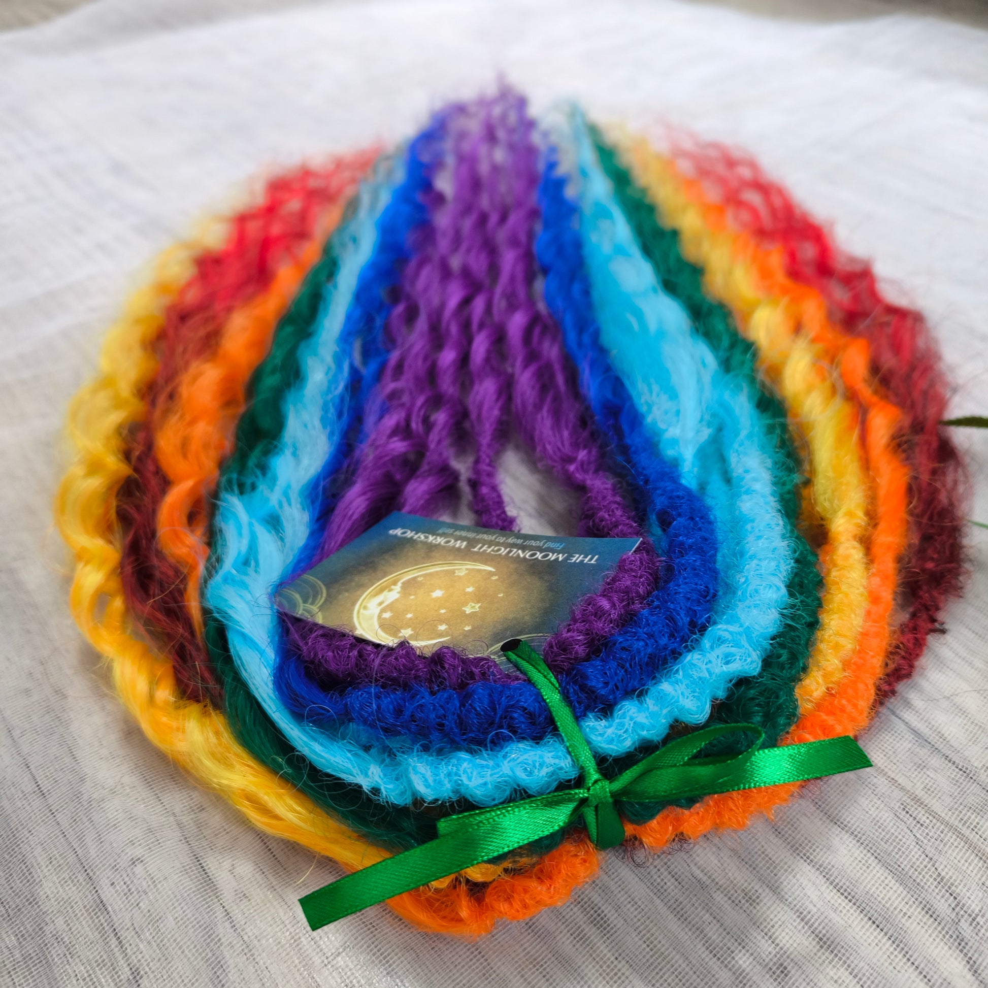 Rainbow: red, orange, yellow, green, light and dark blue, purple - soft, lightweight, and reusable synthetic DE regular curls (NOT BRUSHABLE). This set is a great colorful accent to any of your sets (curls or dreads).

The length:
Standard dreaded - 22-24 inches (55-60 cm), dreaded part ±4-5 inches
Push-up / Dolly - 20-22 inches (50-55 cm), dreaded part ±4 inches (from working side).