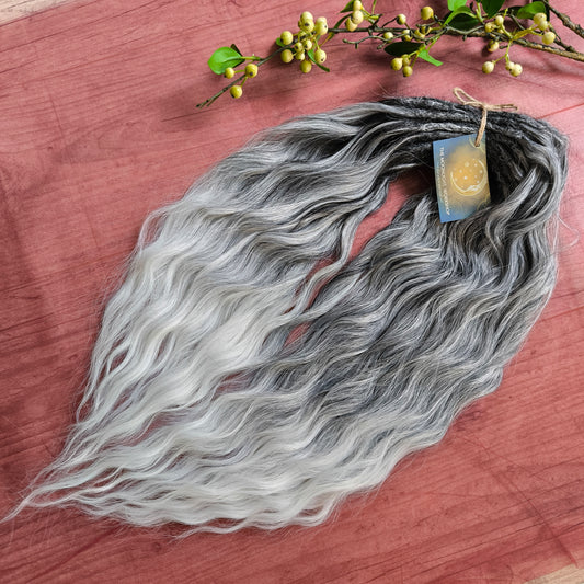 Ombre from grey to white (salt and pepper) soft, lightweight, and reusable synthetic brushable double ended wavy dreadlocks (regular dreaded, braided middle, or push-up).


The length:
Standard dreaded - 22-24 inches (55-60 cm), dreaded part ±4-5 inches
Braided middle - 22-24 inches (55-60 cm), braid ±4-5 inches folded (total ±8-10 inches)
Push-up / Dolly - 20-22 inches (50-55 cm), dreaded part ±4 inches (from working side)