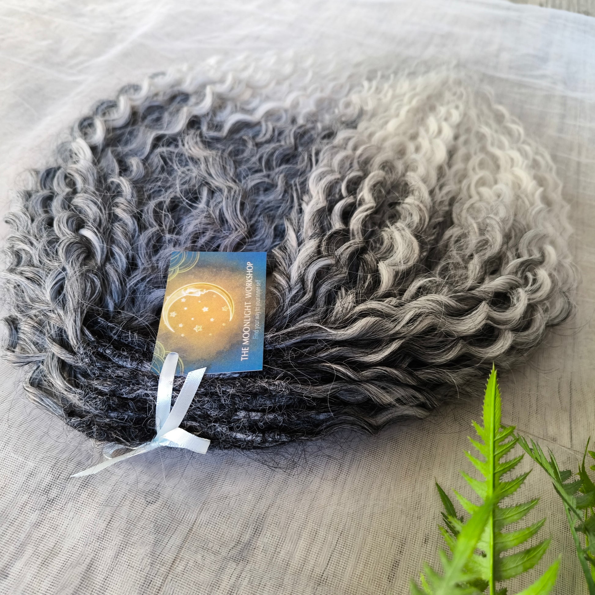 Salt and pepper: ombre from grey to white soft, lightweight, and reusable synthetic brushable double ended wavy dreadlocks (NOT BRUSHABLE).

The length:
Standard dreaded - 22-24 inches (55-60 cm), dreaded part ±3-4 inches
Push-up / Dolly - 20-22 inches (50-55 cm), dreaded part ±4 inches