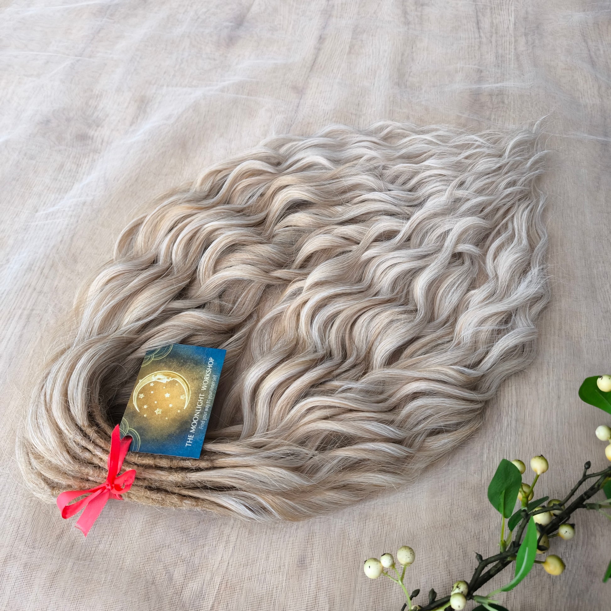 Ombre from warm blonde to platinum blonde soft, lightweight, and reusable synthetic brushable double ended wavy dreadlocks (regular dreaded, braided middle, or push-up).&nbsp;


The length:
Standard dreaded - 22-24 inches (55-60 cm), dreaded part ±4-5 inches
Braided middle - 22-24 inches (55-60 cm), braid ±4-5 inches folded (total ±8-10 inches)
Push-up / Dolly - 20-22 inches (50-55 cm), dreaded part ±4 inches (from working side)