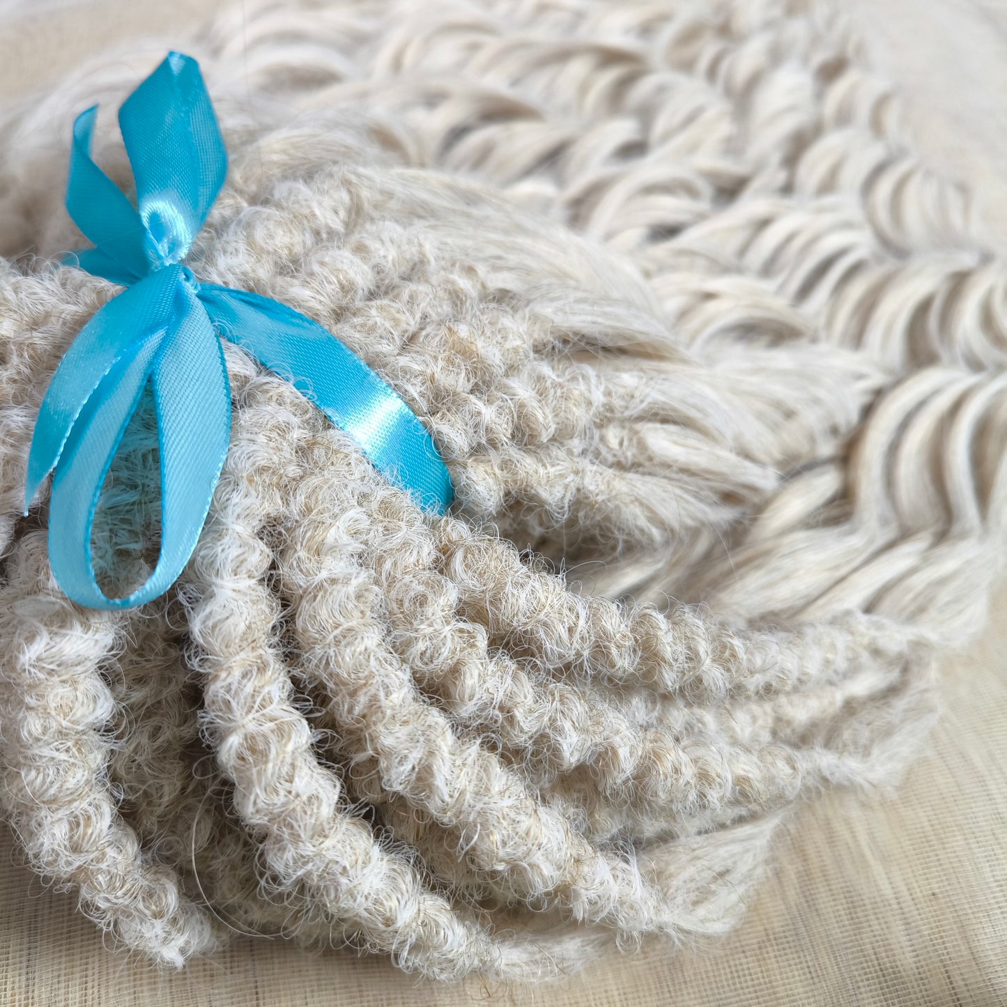 Platinum blonde soft, lightweight, and reusable synthetic brushable double ended wavy dreadlocks (regular dreaded, braided middle, or push-up).


The length:
Standard dreaded - 22-24 inches (55-60 cm), dreaded part ±4-5 inches
Braided middle - 22-24 inches (55-60 cm), braid ±4-5 inches folded (total ±8-10 inches)
Push-up / Dolly - 20-22 inches (50-55 cm), dreaded part ±4 inches (from working side)